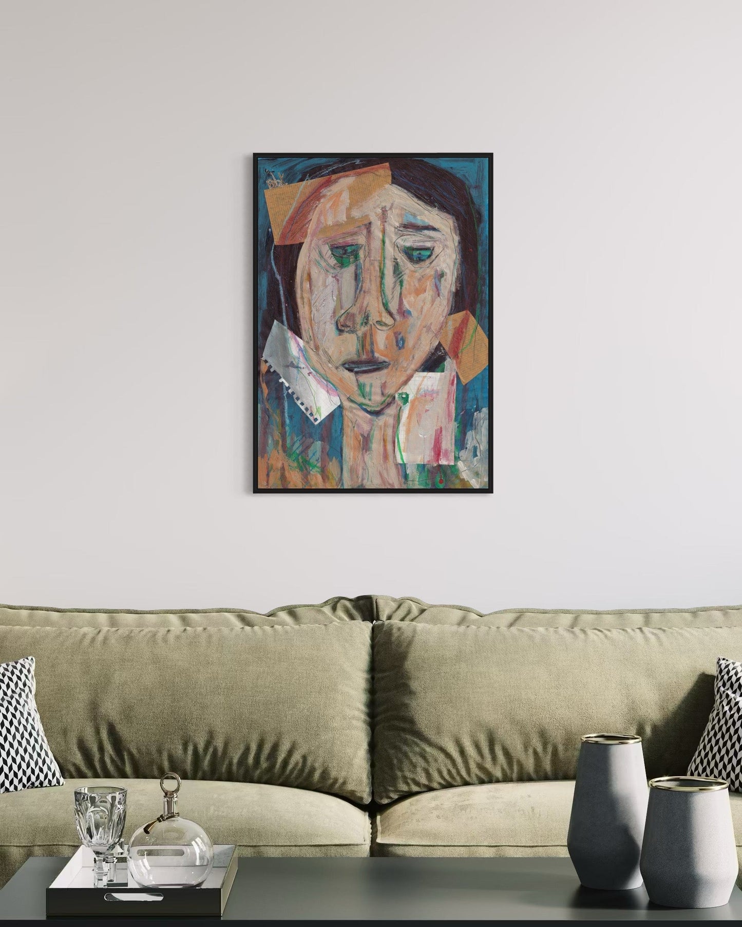 Abstract painting on a wall above a sofa in a living room