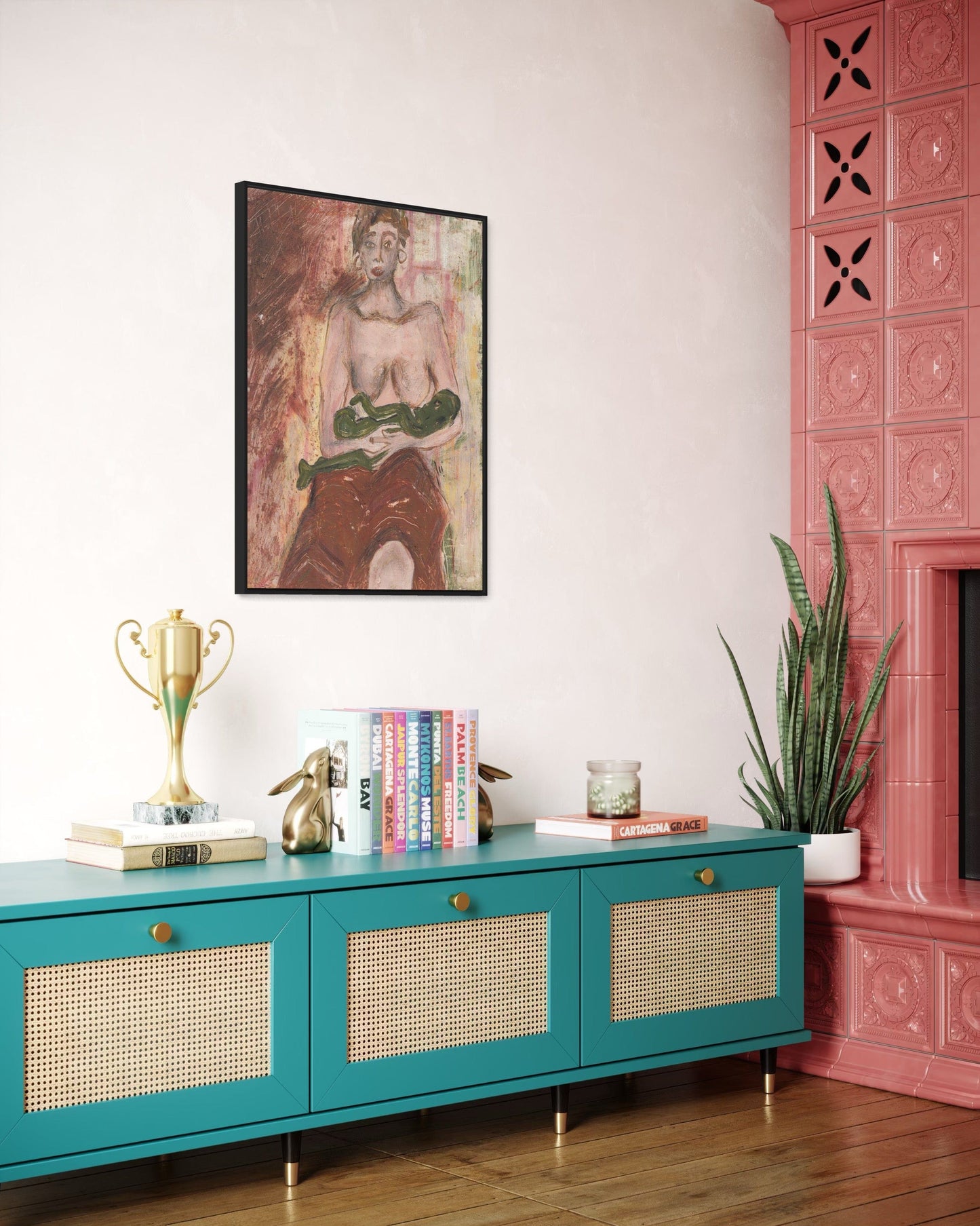 Teal sideboard with wicker doors in a room with pink tiled fireplace and framed artwork.