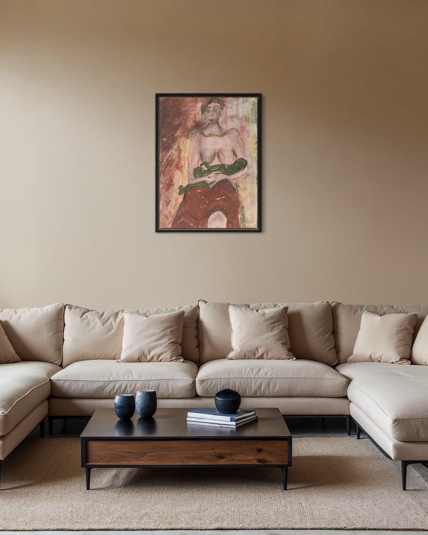 Beige sectional sofa in a living room with a framed artwork on the wall.