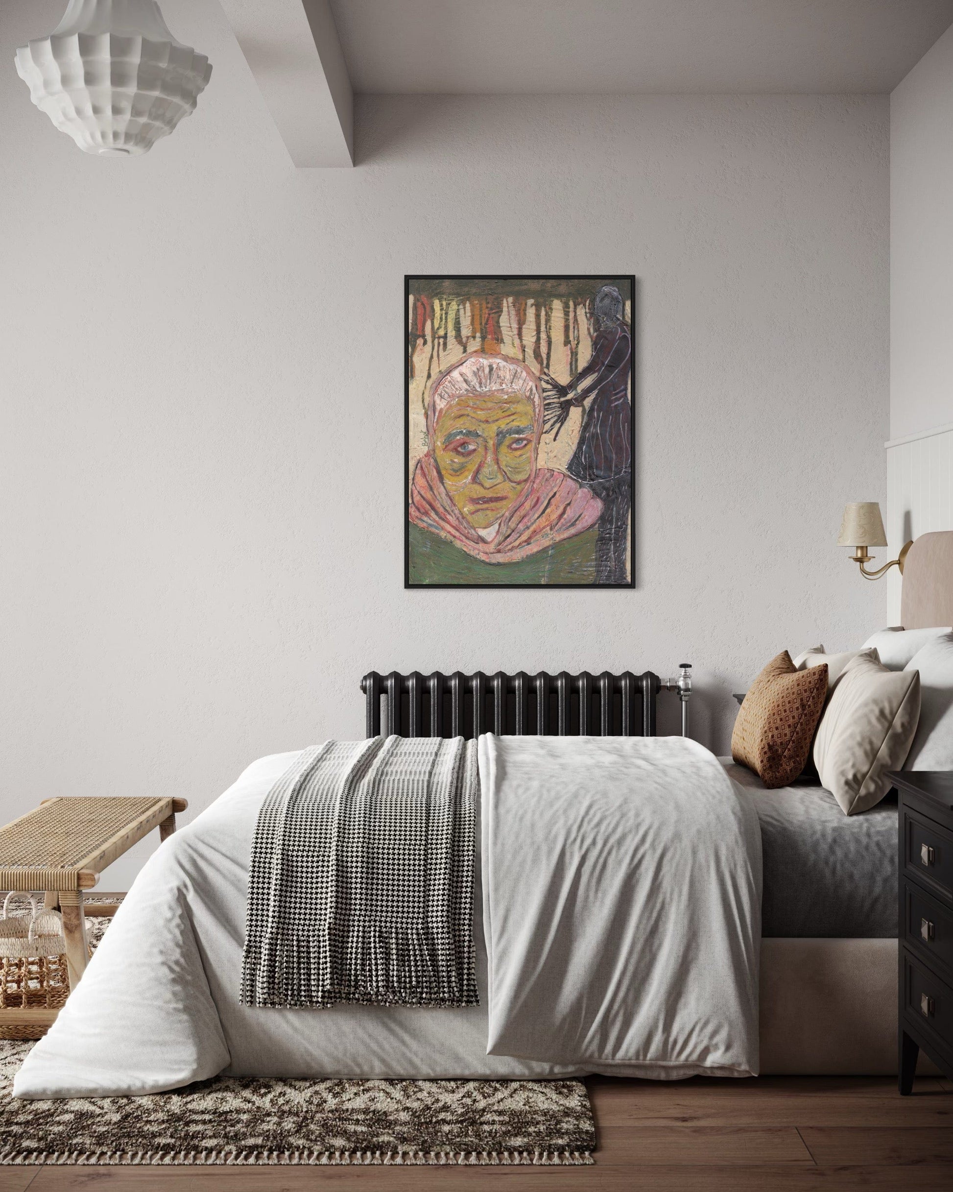Modern bedroom with a bed, artwork on the wall, and decorative elements.