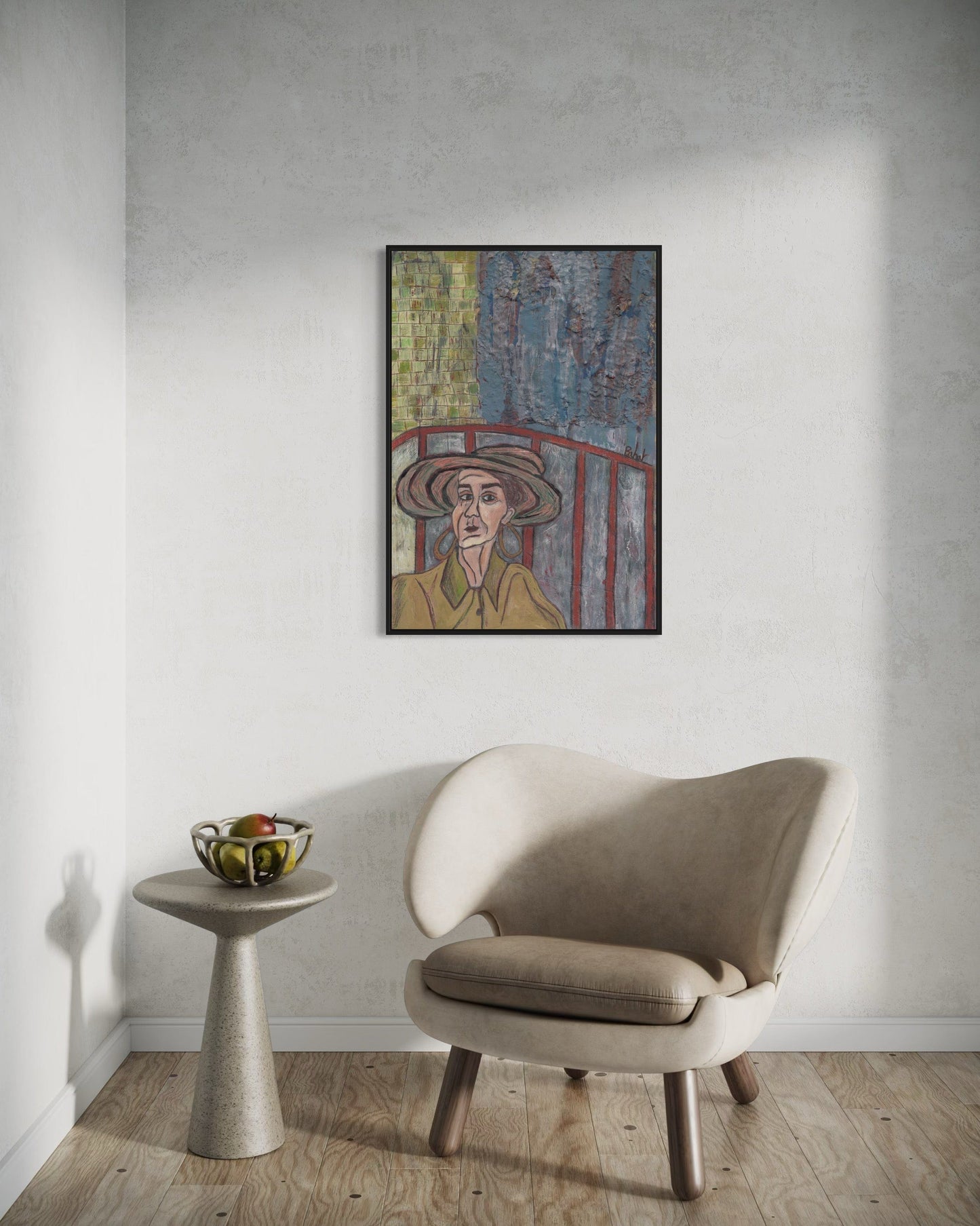 Framed artwork on a wall above a modern chair and side table.
