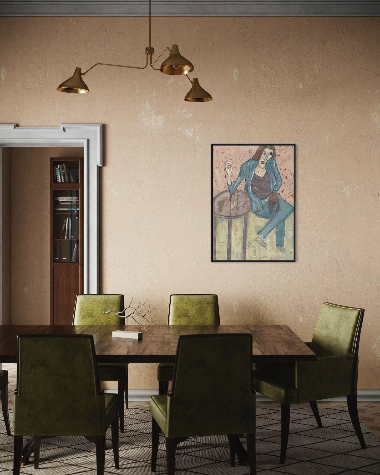 Dining room with wooden table and green chairs, framed artwork on the wall.