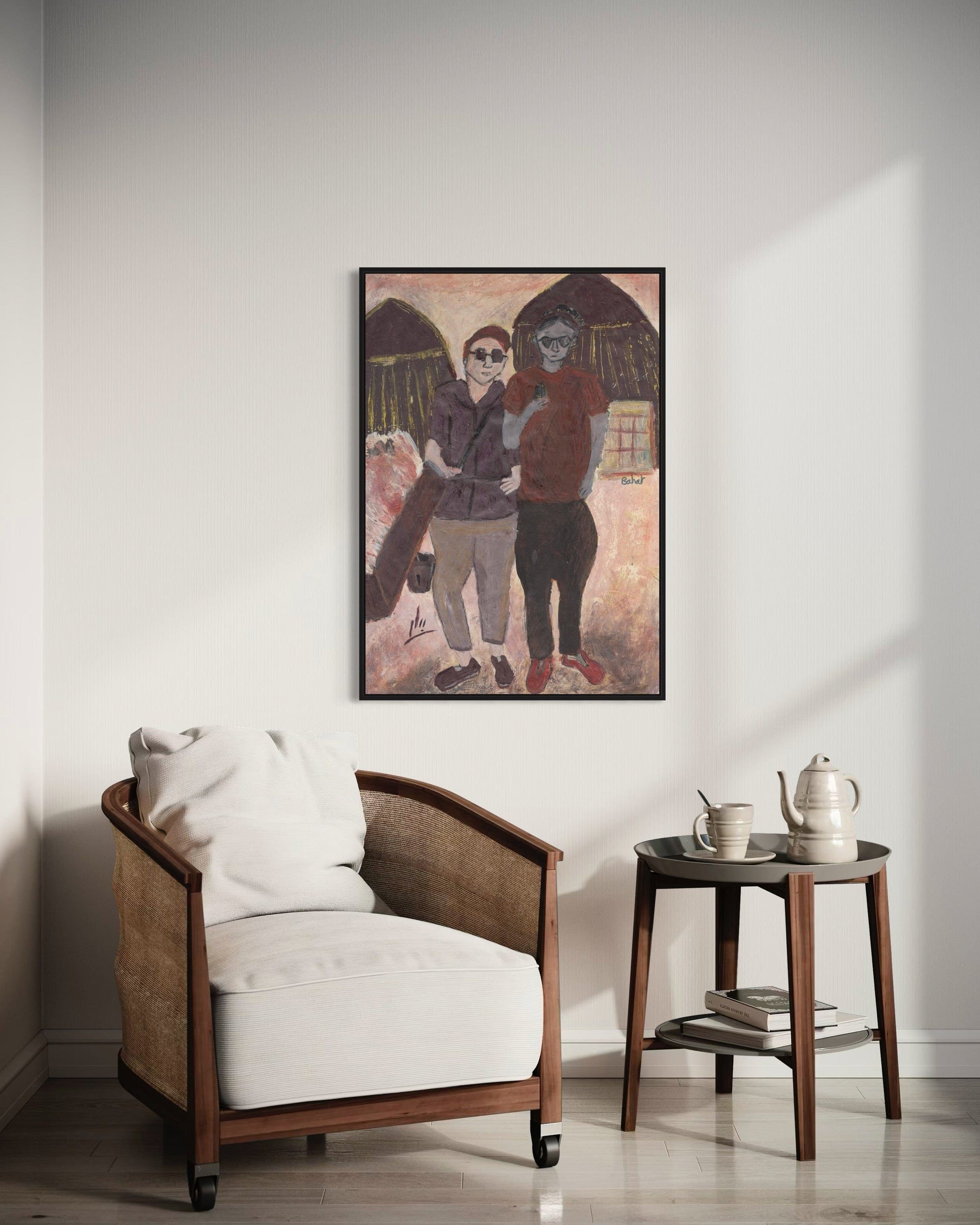 Room interior with a wooden armchair, side table, and framed artwork on the wall.
