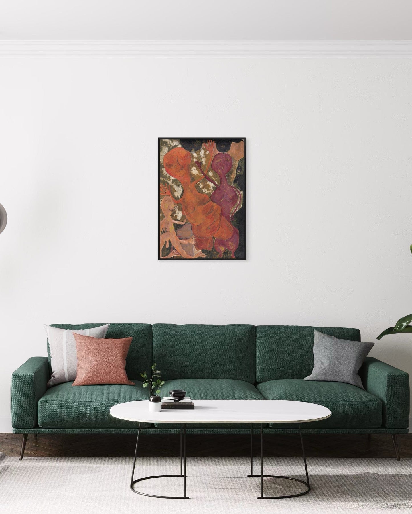 Modern living room with a green sofa, white coffee table, and abstract art on the wall.