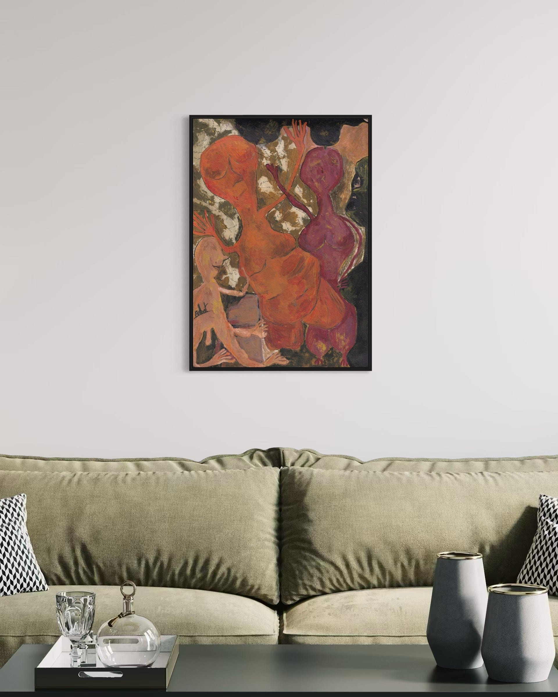 Abstract painting on a wall above a sofa with decorative items on a table.