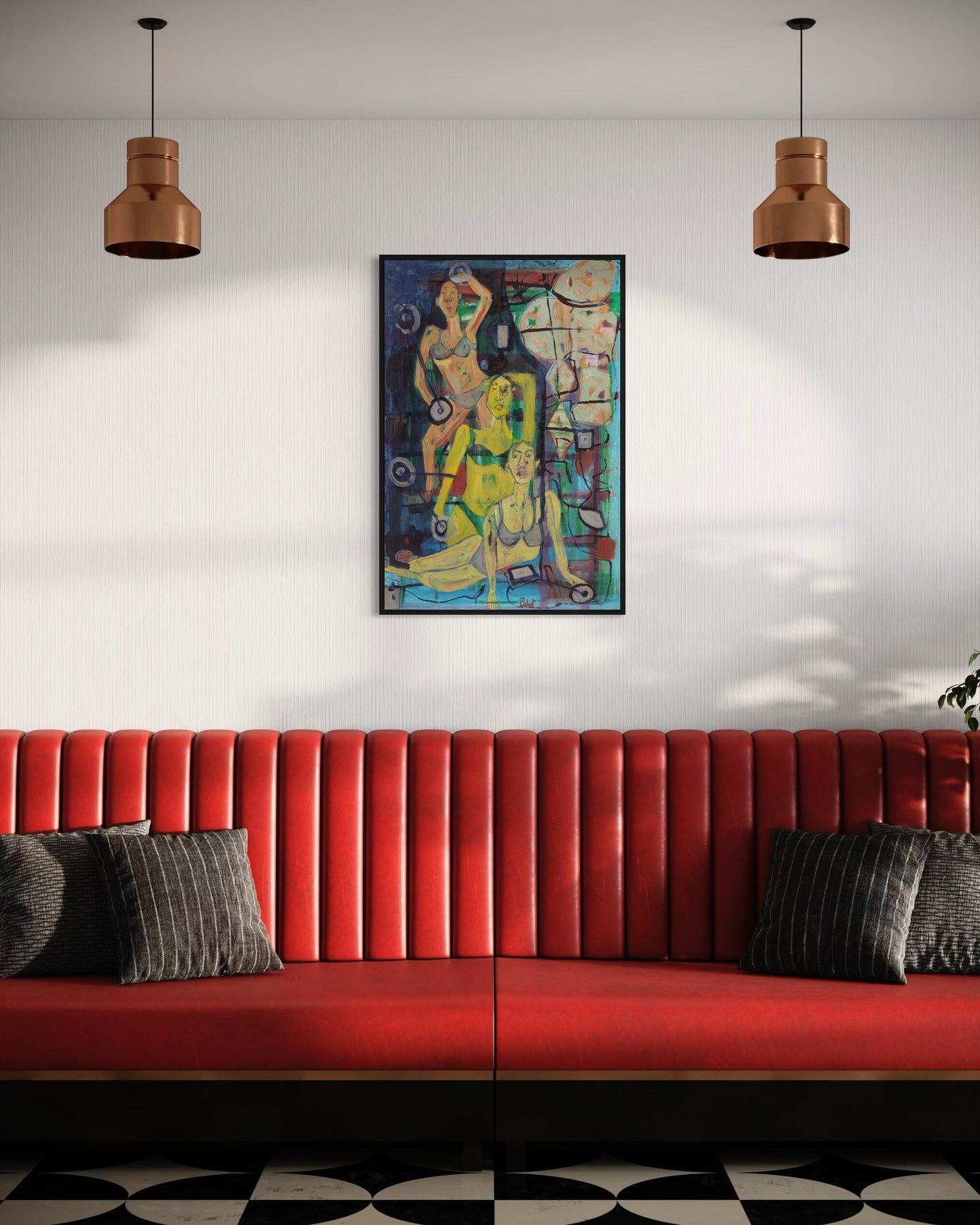 Red sofa with gray cushions in a room with a colorful abstract painting on the wall.