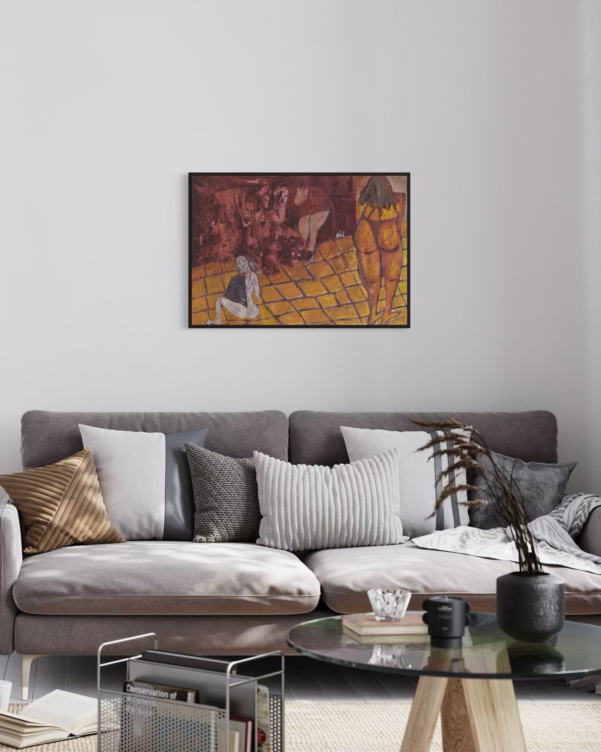 Living room with a gray sofa, decorative pillows, and a colorful abstract painting on the wall.
