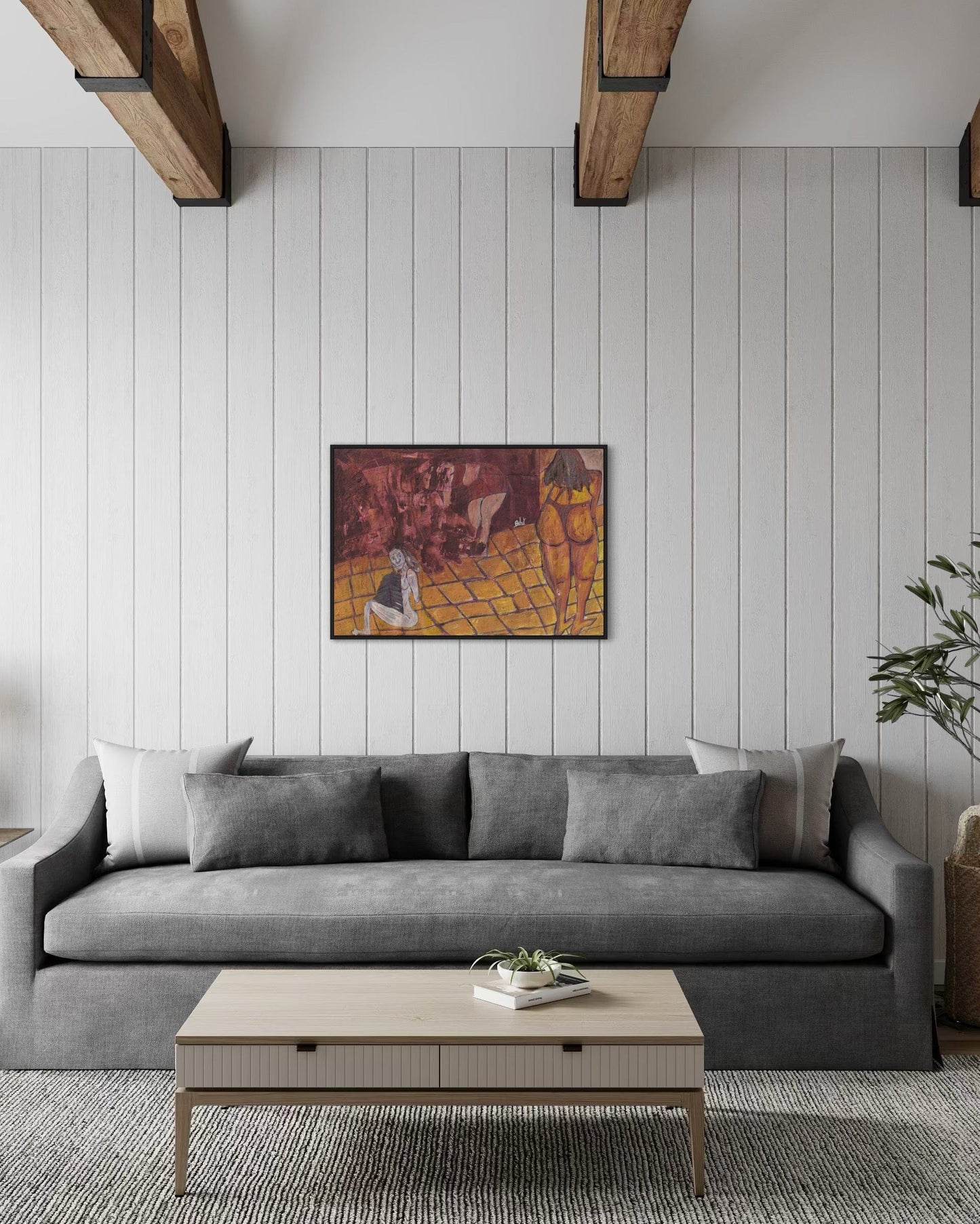 Living room with a gray sofa, wooden coffee table, and abstract painting on the wall.