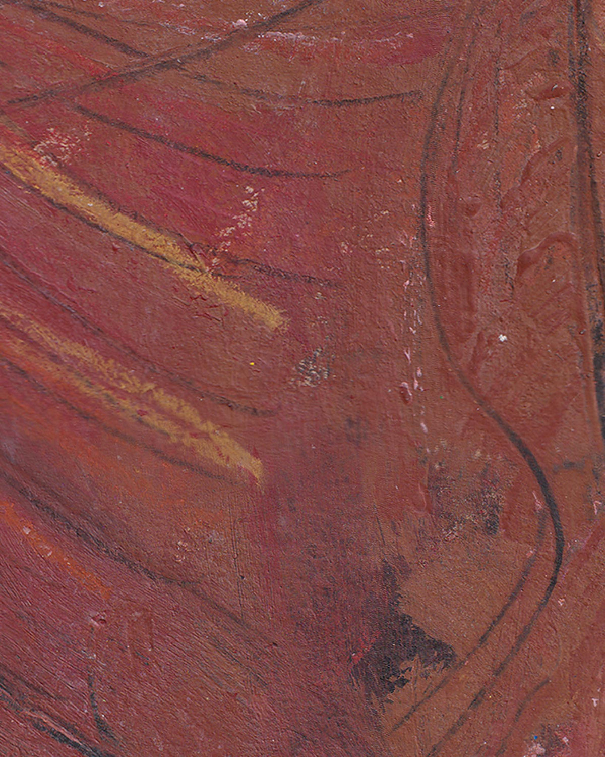 Close-up of a textured surface with red and brown colors