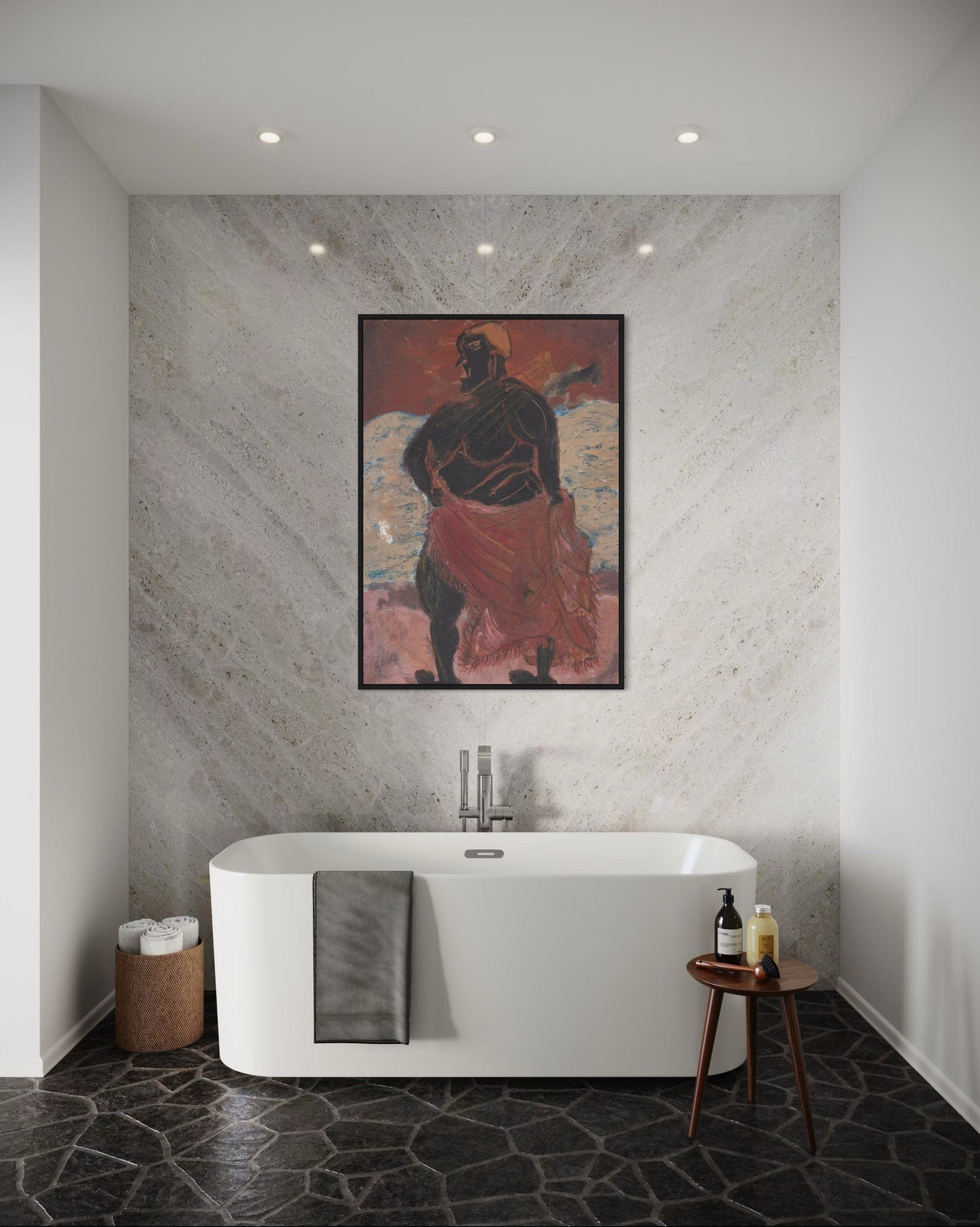 Modern bathroom with a freestanding bathtub, decorative wall art, and a small table with items.