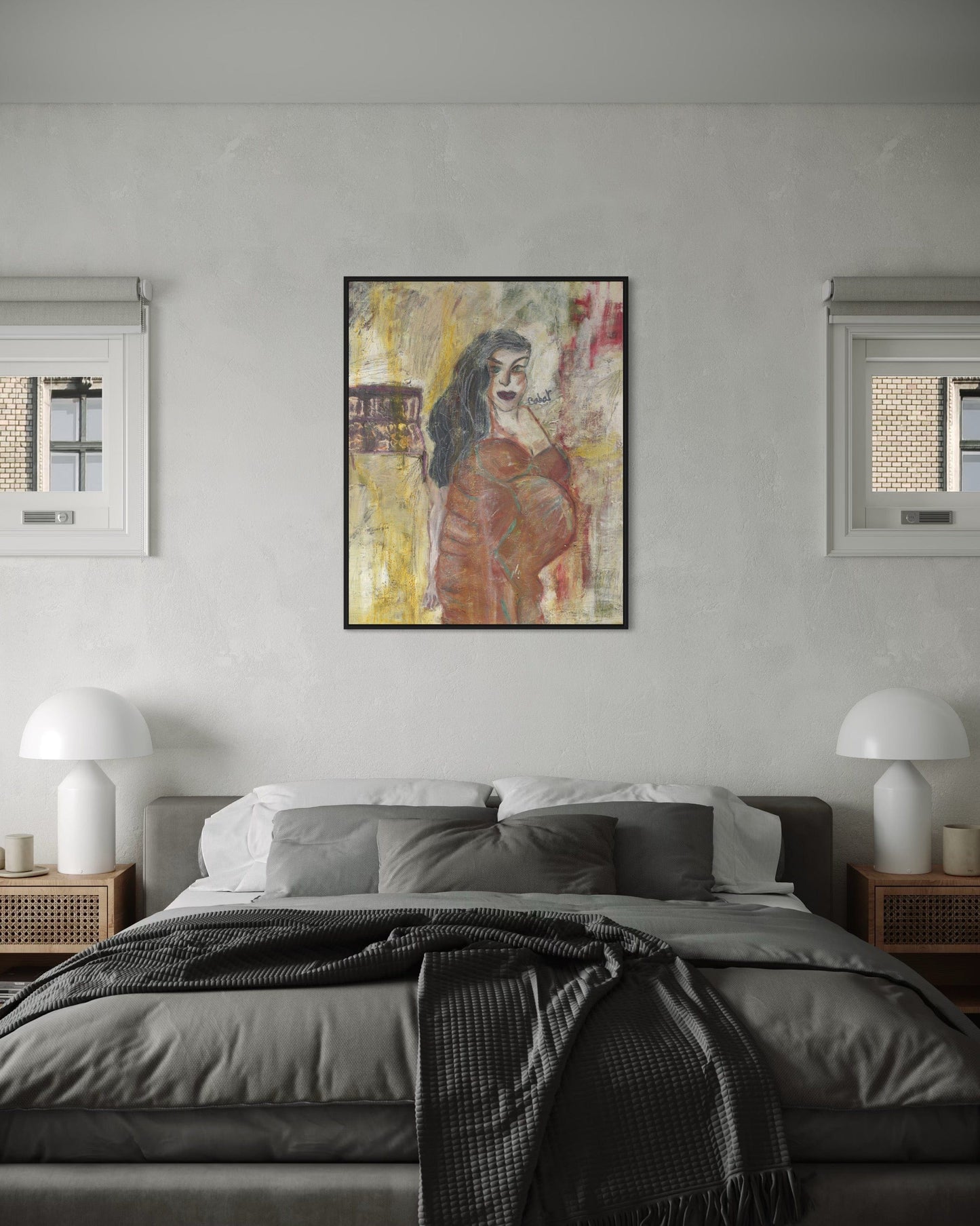 Modern bedroom with a bed, nightstands, and a framed artwork on the wall.