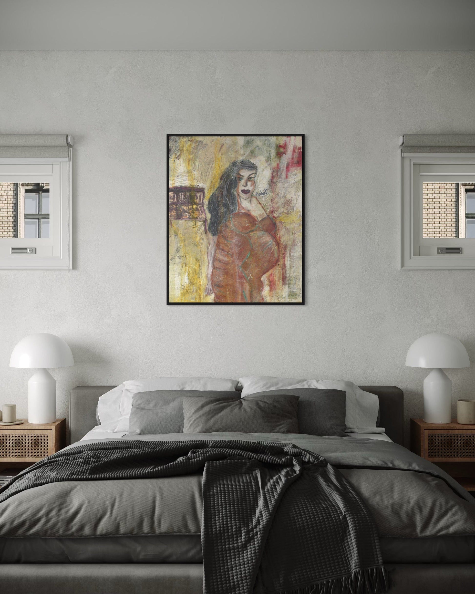 Modern bedroom with a bed, nightstands, and a framed artwork on the wall.