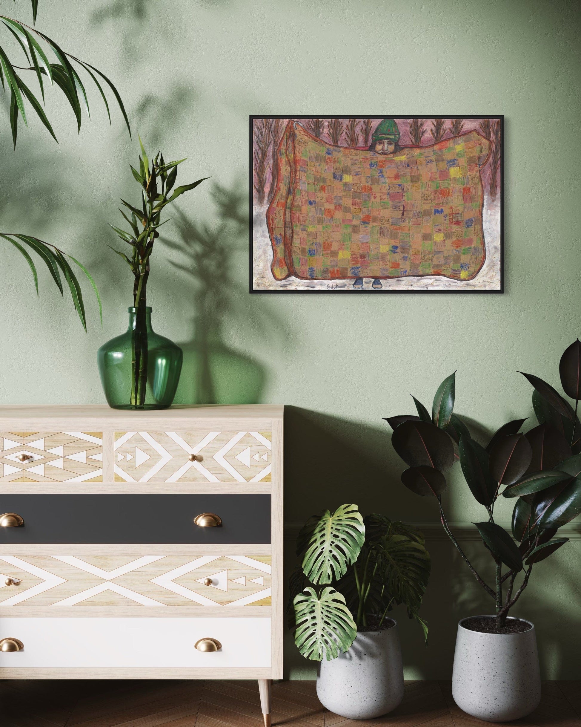 Decorative dresser with geometric patterns, plants, and a colorful abstract painting on a green wall.
