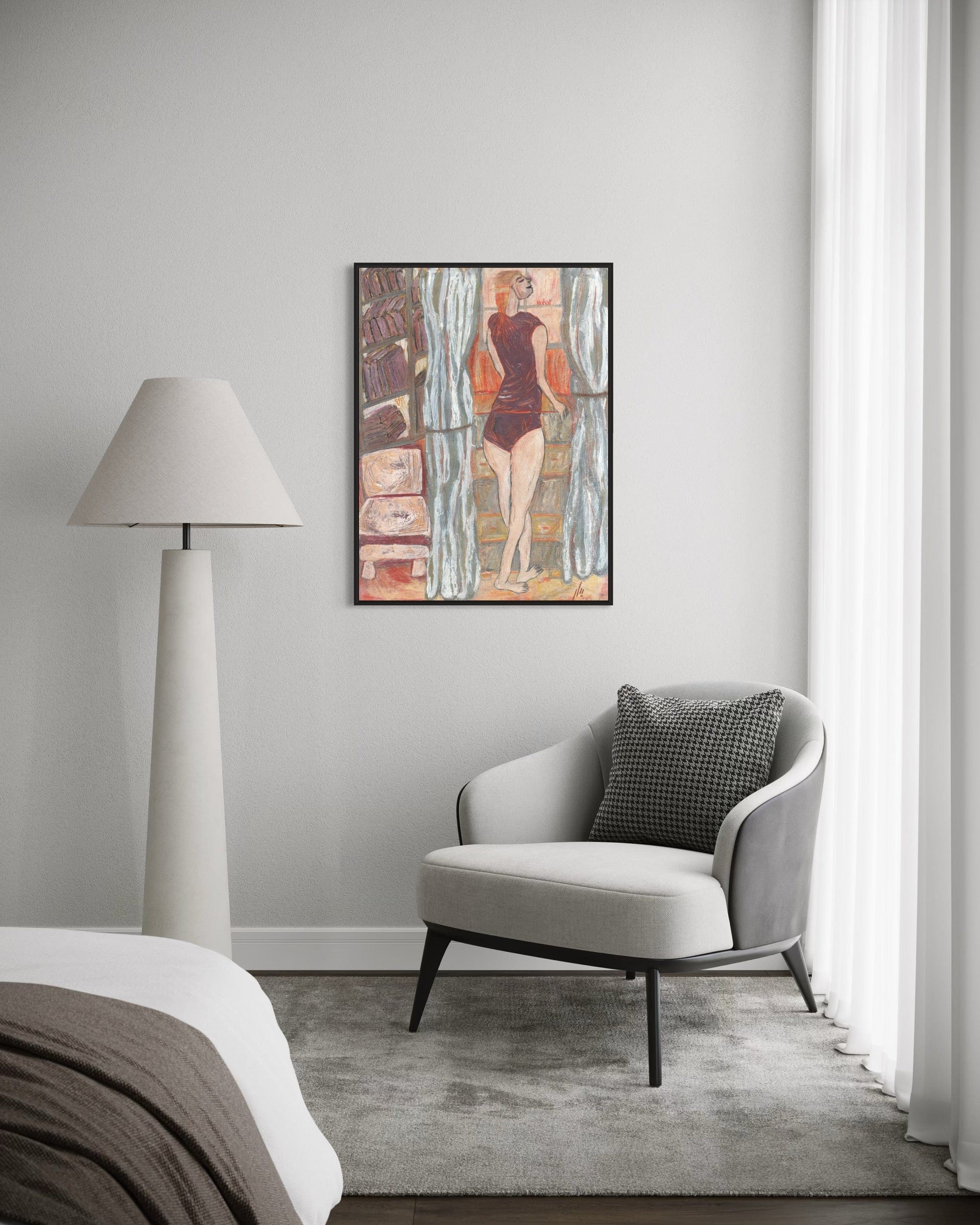 Modern interior with a gray armchair, lamp, and abstract painting on a white wall.