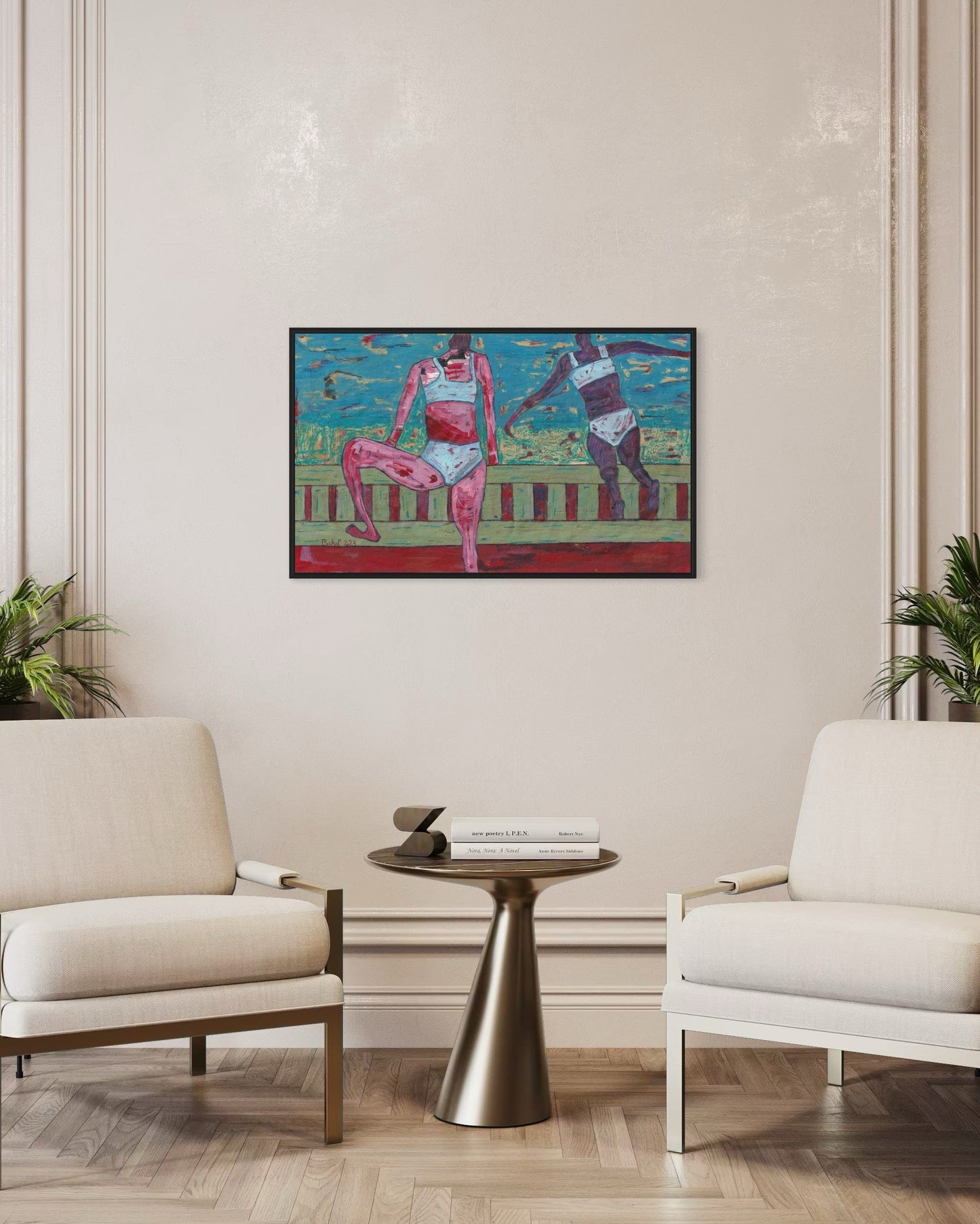 Colorful abstract painting of two figures on a wall in a living room with white chairs and a small table.