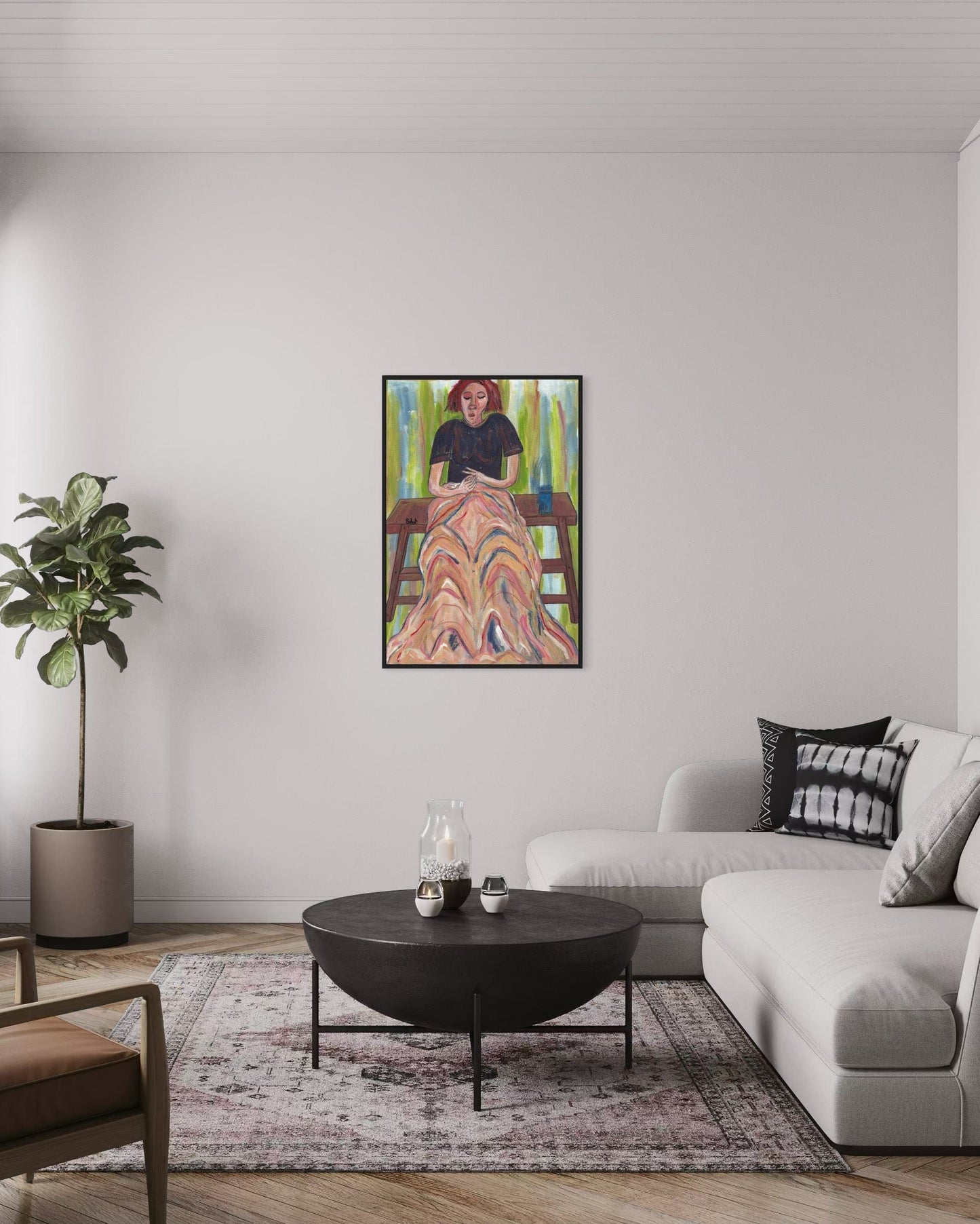 Living room with a modern sofa, coffee table, and a colorful painting on the wall.