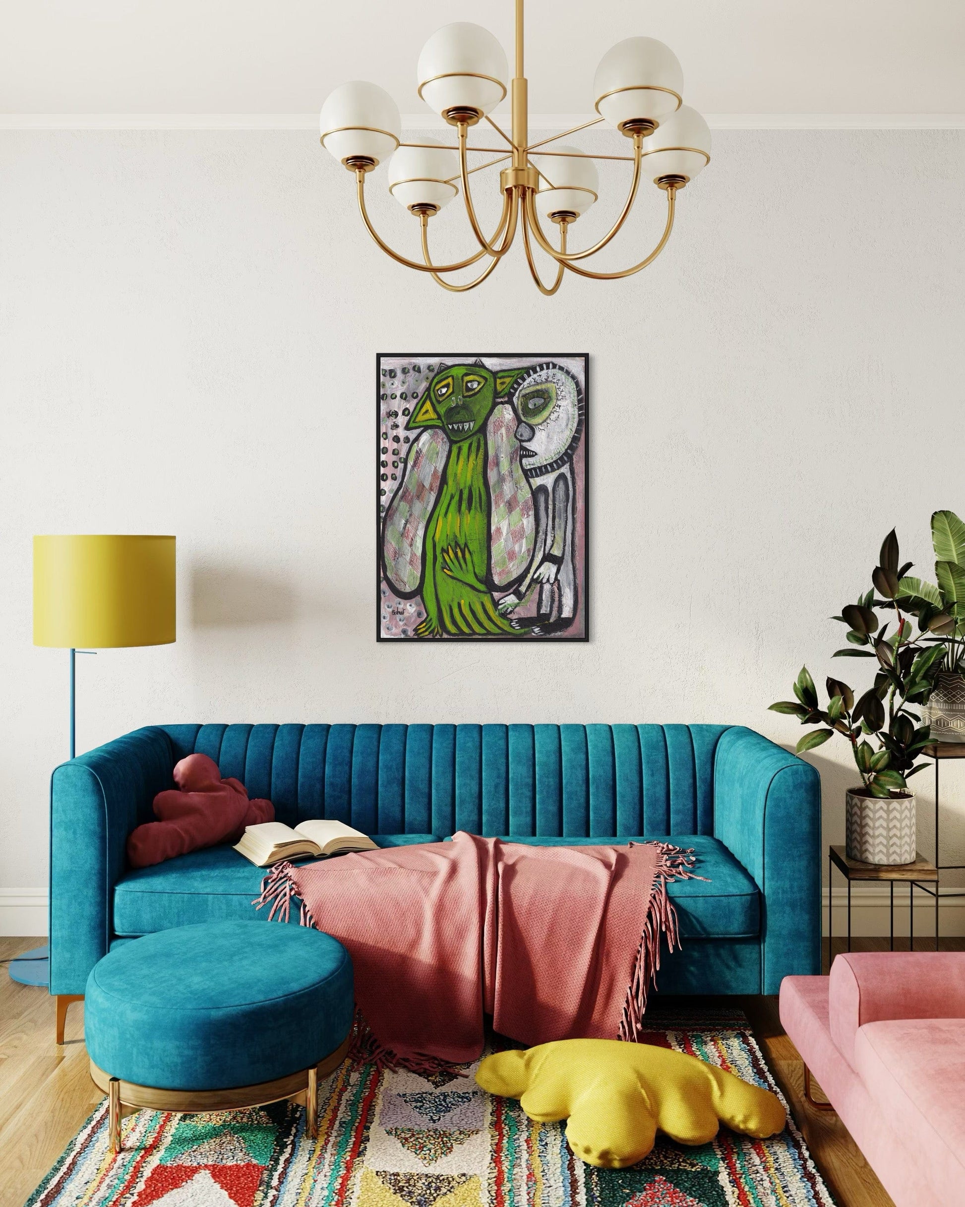 Living room with a blue sofa, pink chair, and colorful rug.
