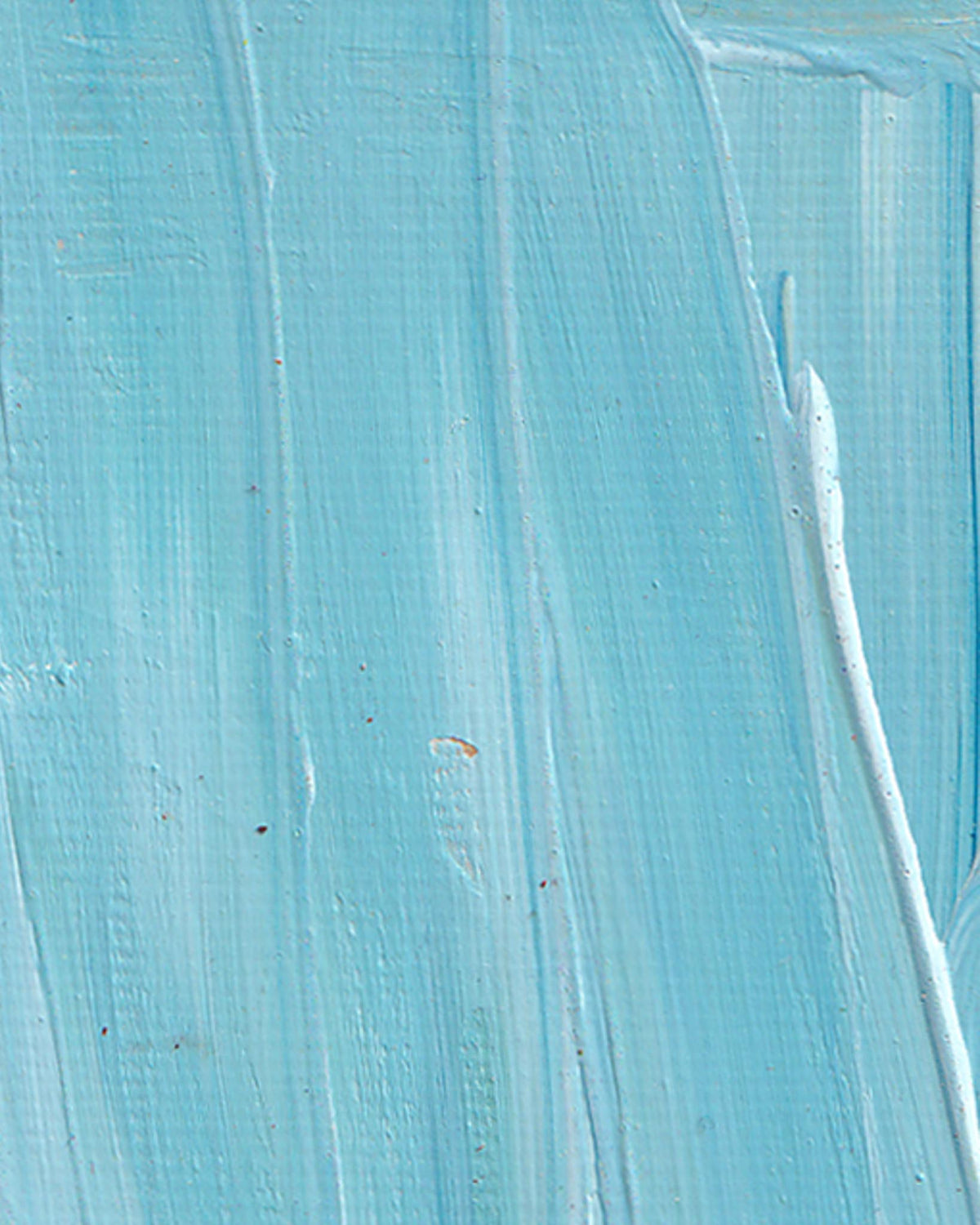 Close-up of textured blue surface with brush strokes