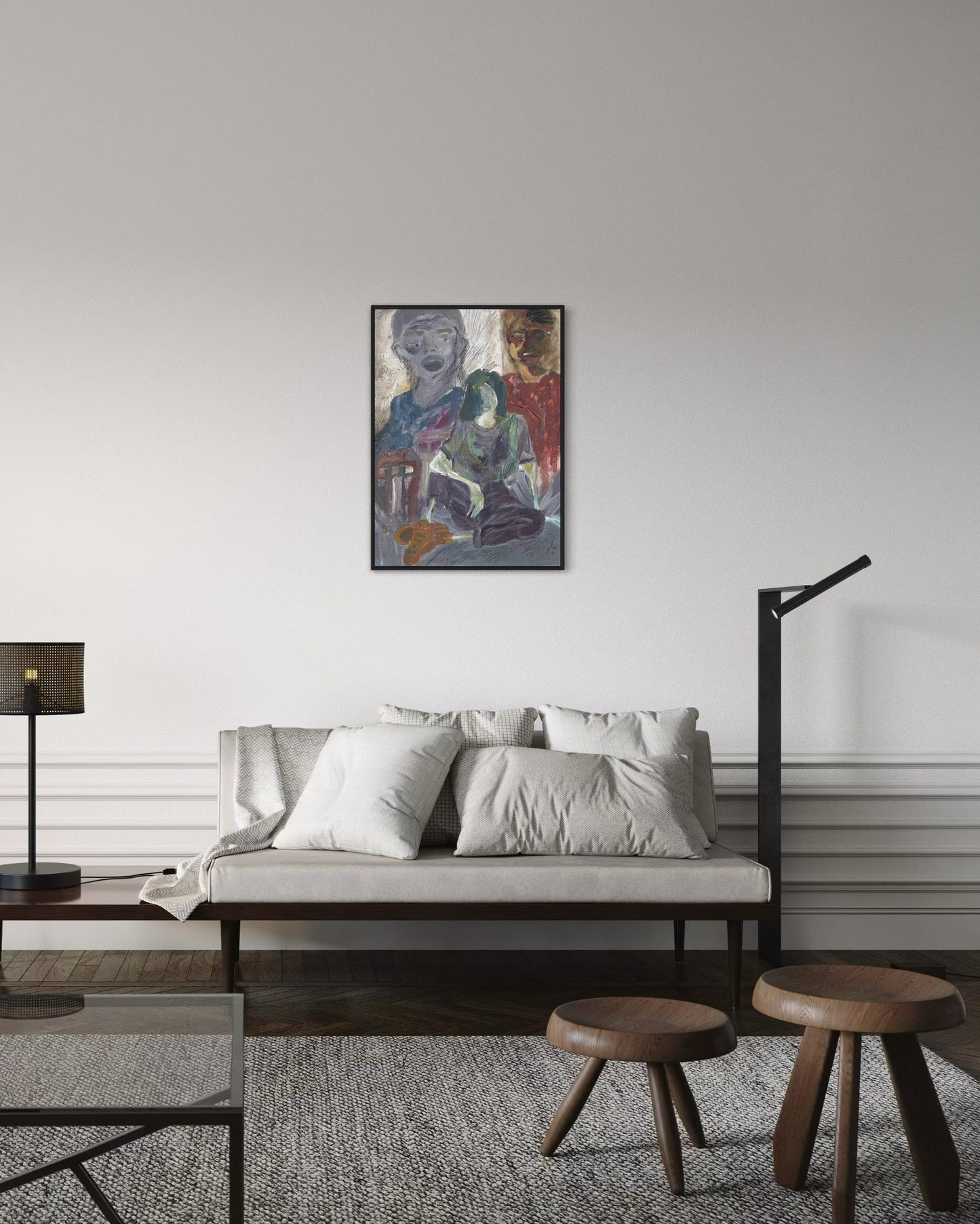 Modern living room with a sofa, coffee table, and abstract painting on the wall.