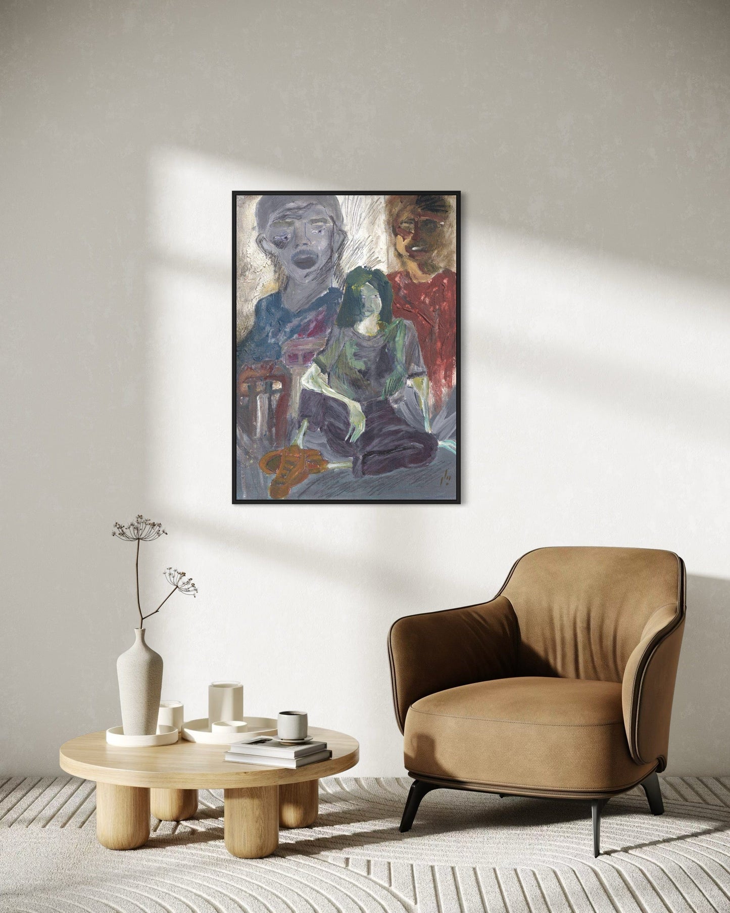 Modern living room with a beige armchair, wooden coffee table, and abstract painting on the wall.