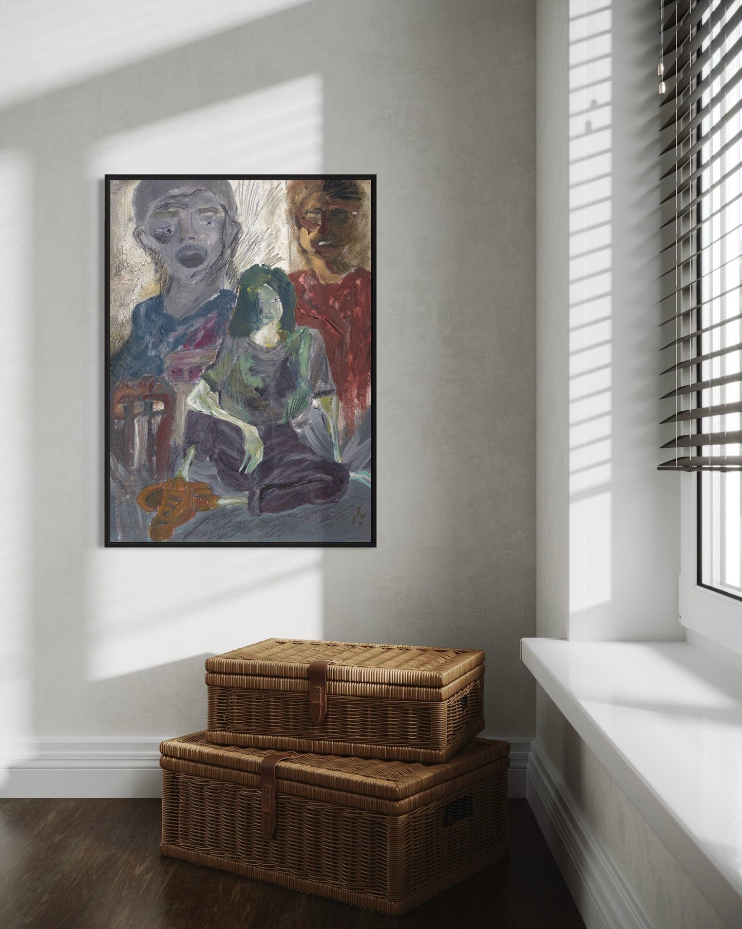 Framed abstract painting on a wall with wicker storage baskets on the floor.