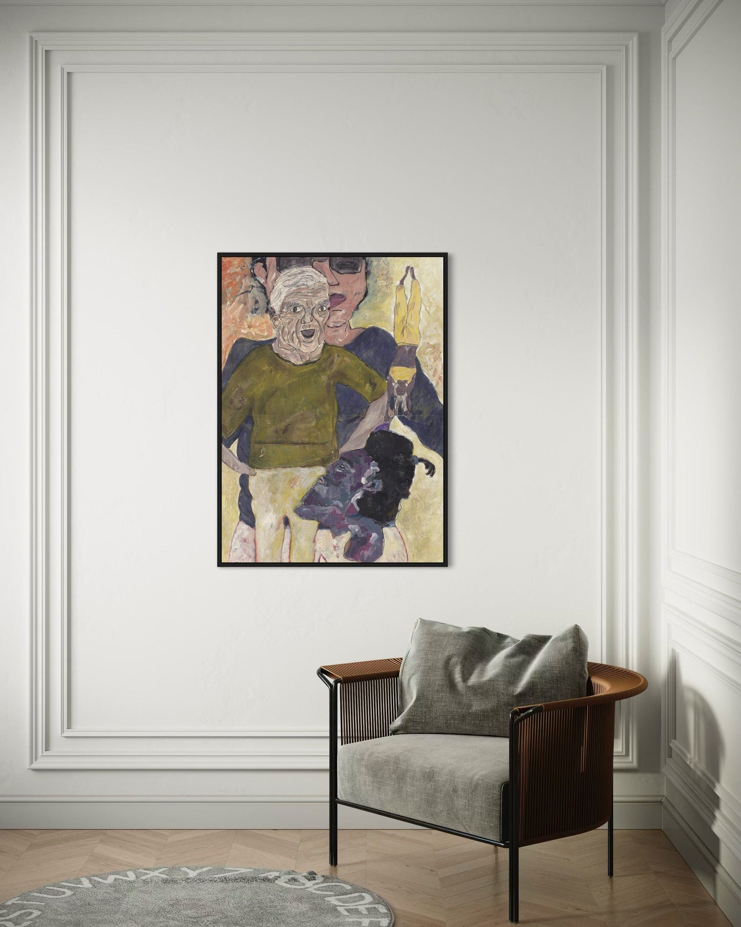 Framed artwork on a wall above a chair with a gray cushion.