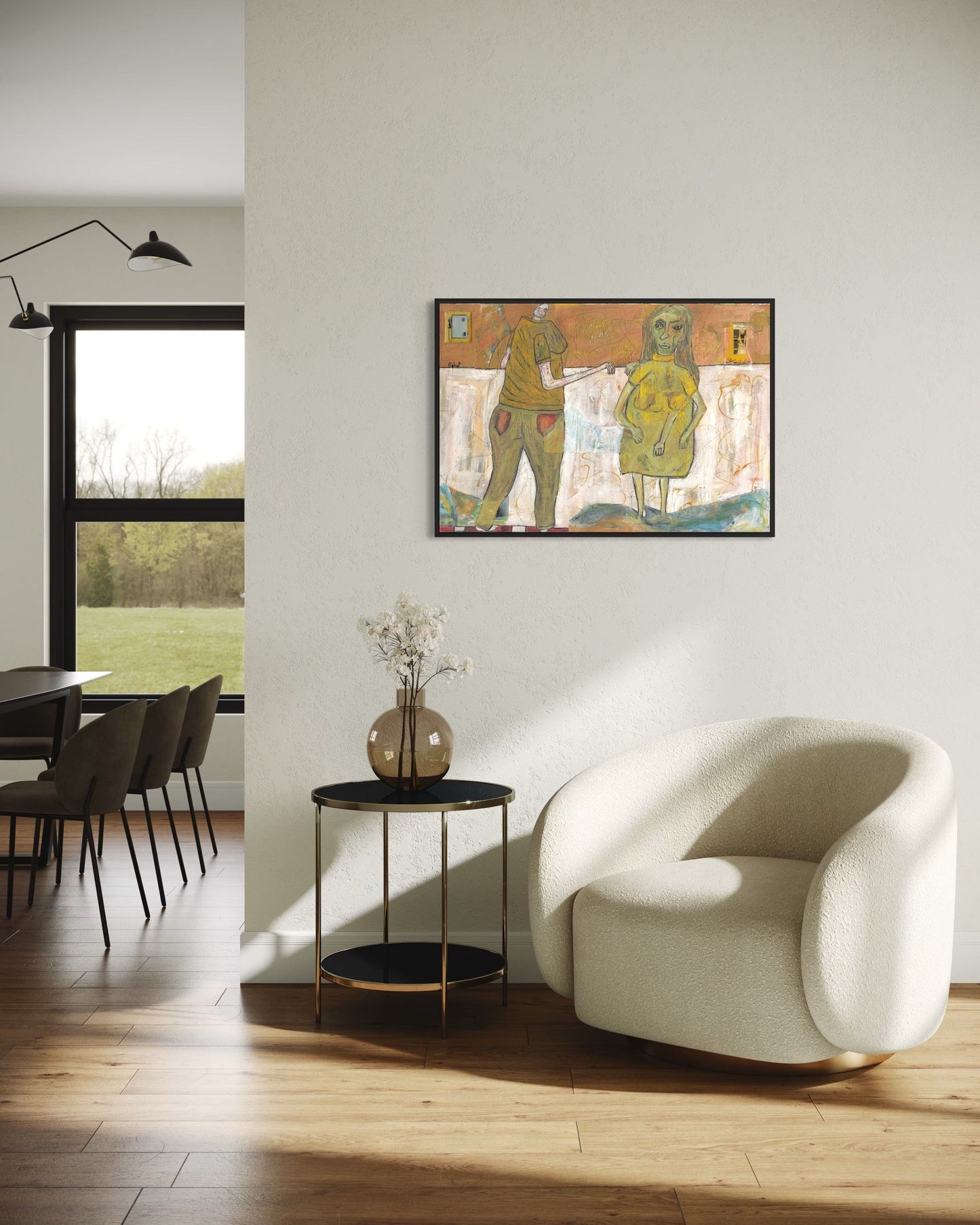 Modern living room with a white armchair, side table, and abstract painting on the wall.