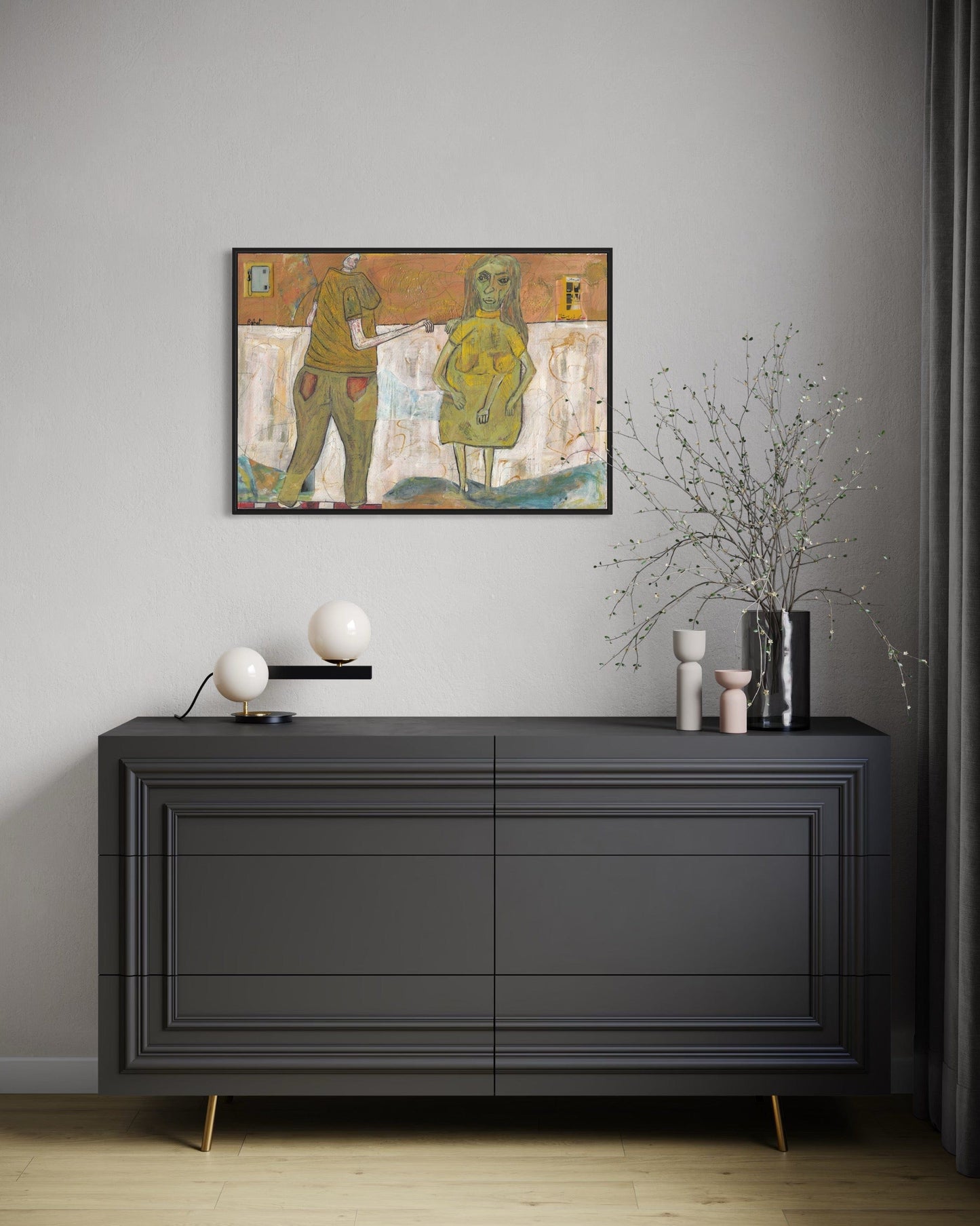 Modern interior with a dark gray dresser, decorative items, and a framed artwork on a gray wall.