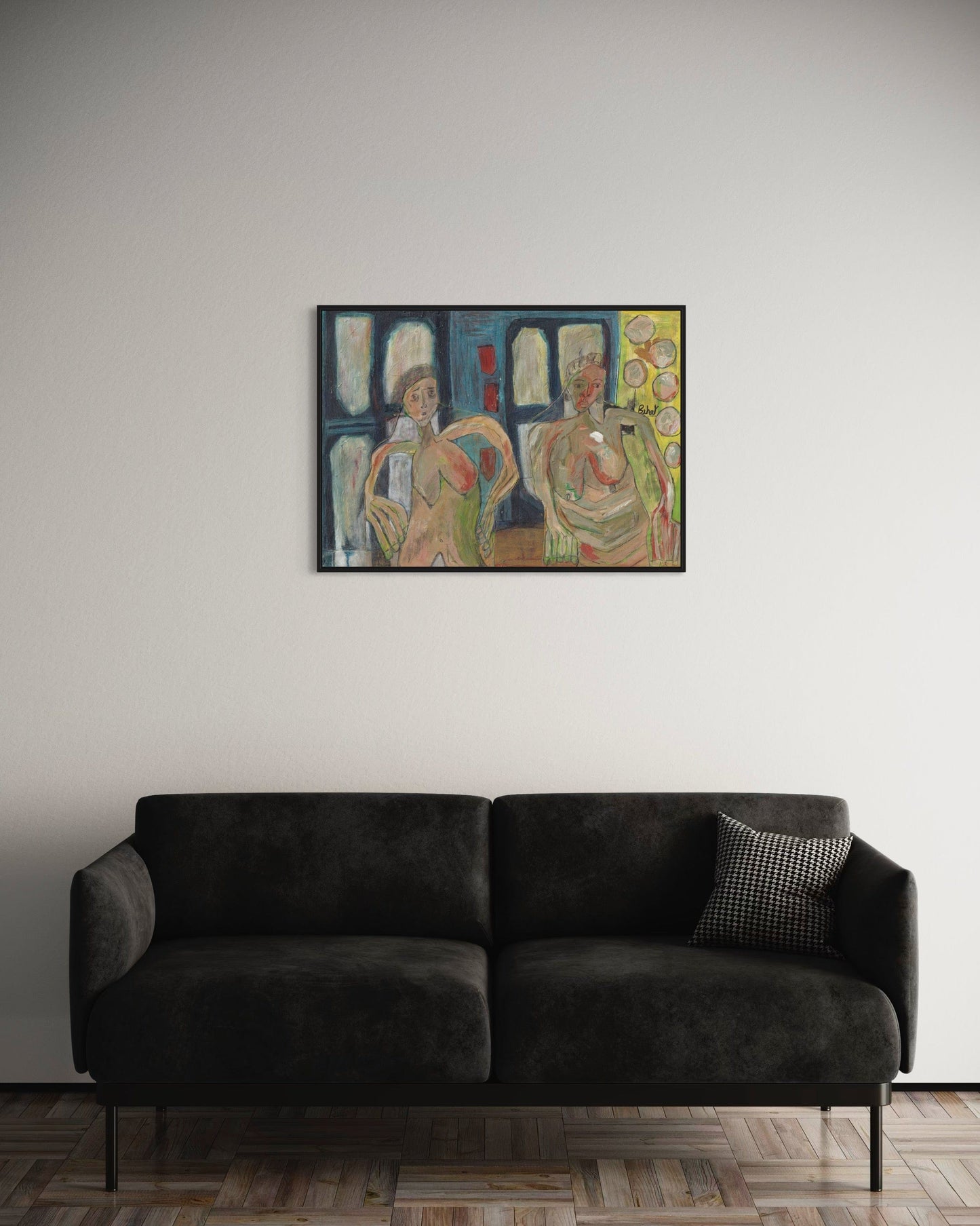 Sofa with a painting above it on a plain wall