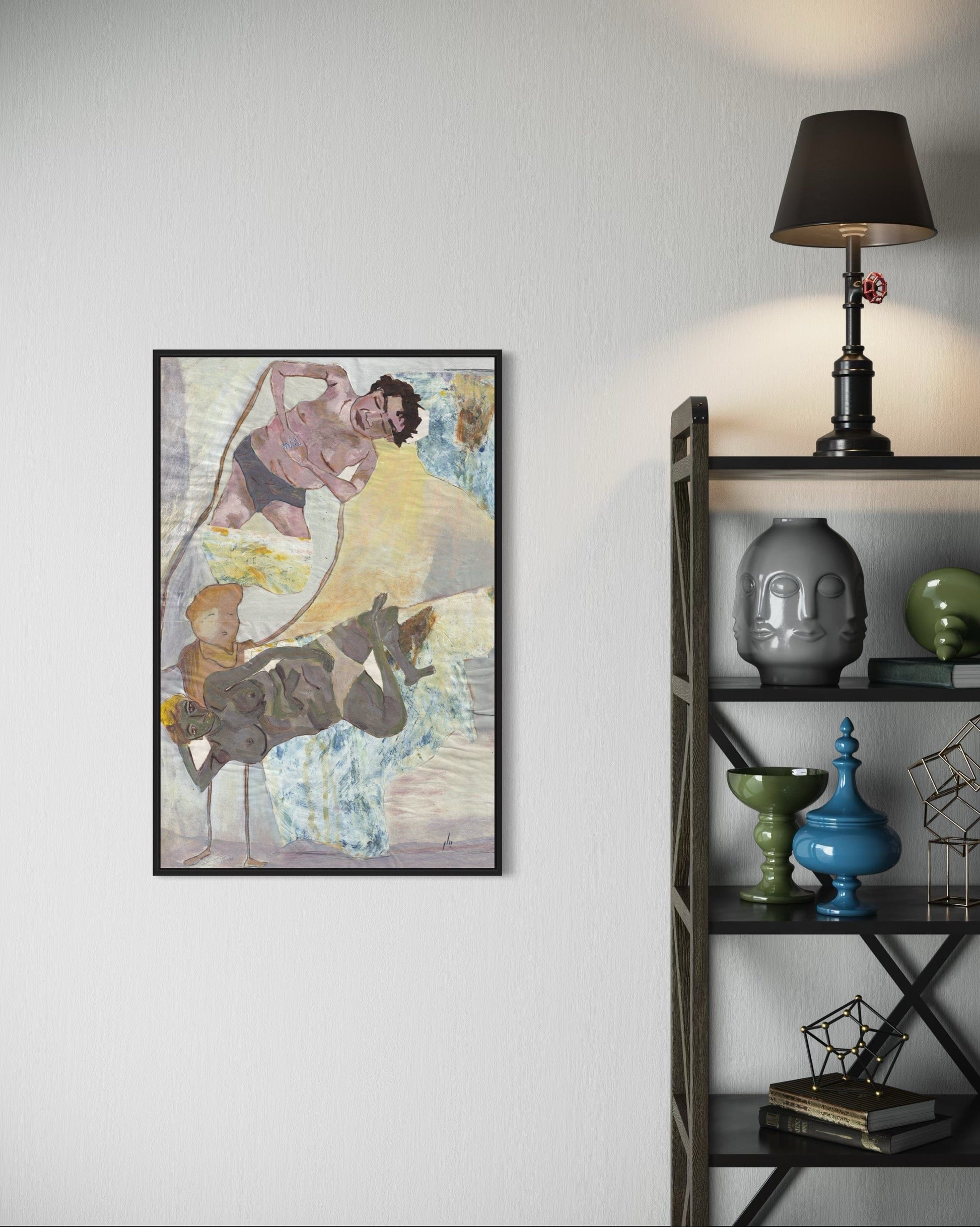 Framed artwork on a wall next to a shelf with decorative items