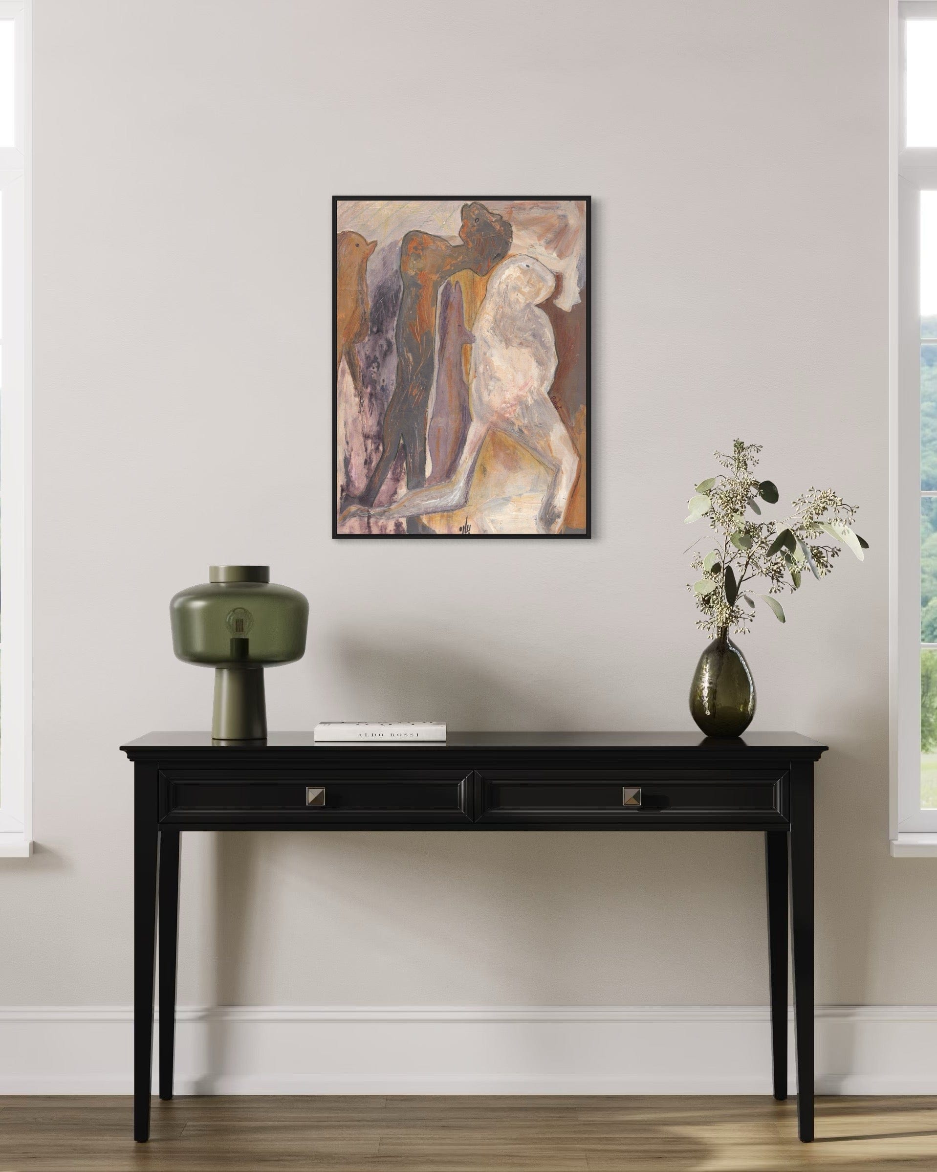 Abstract painting on a wall above a black console table with decorative items.