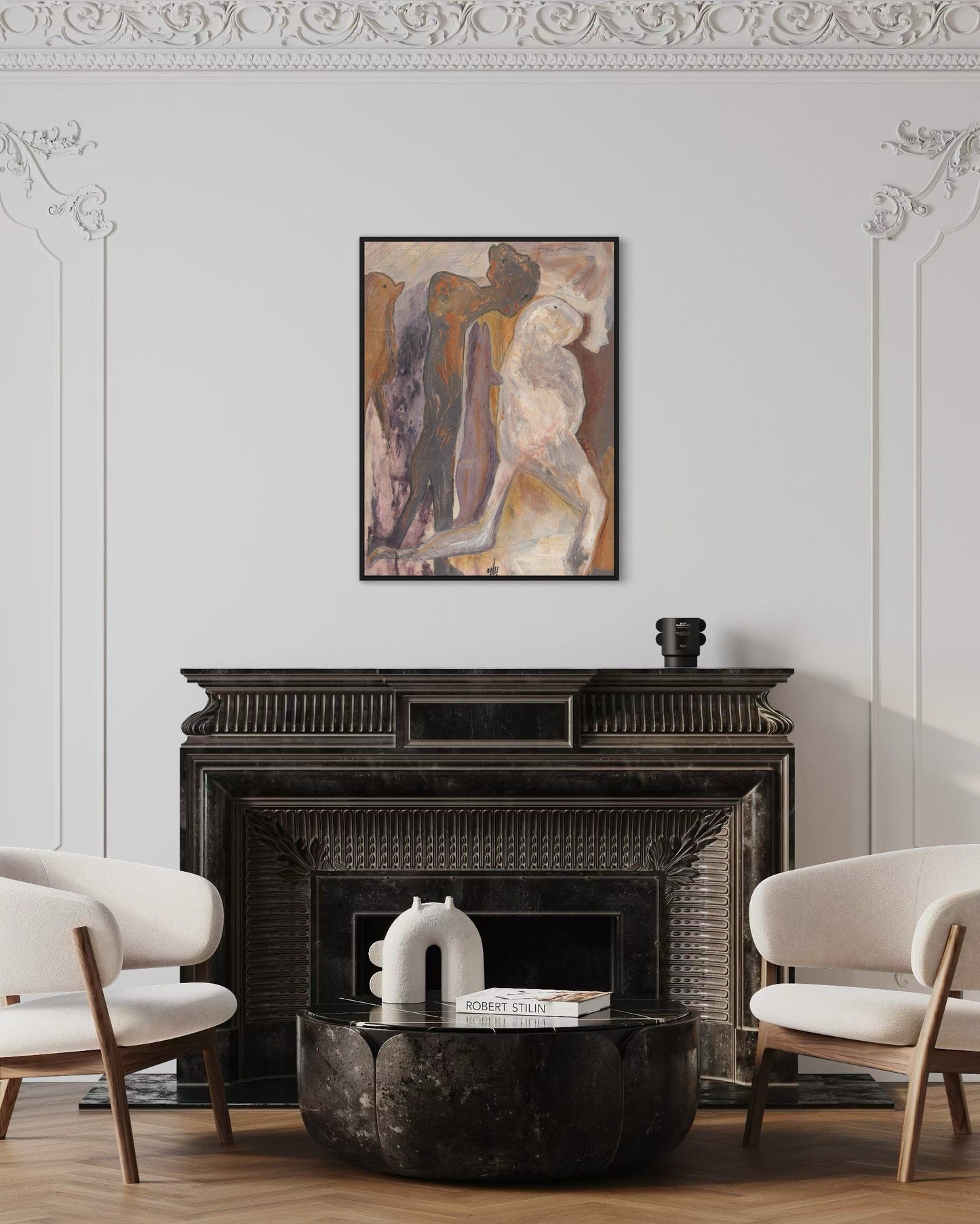 Living room with a fireplace, abstract art above it, and two chairs.
