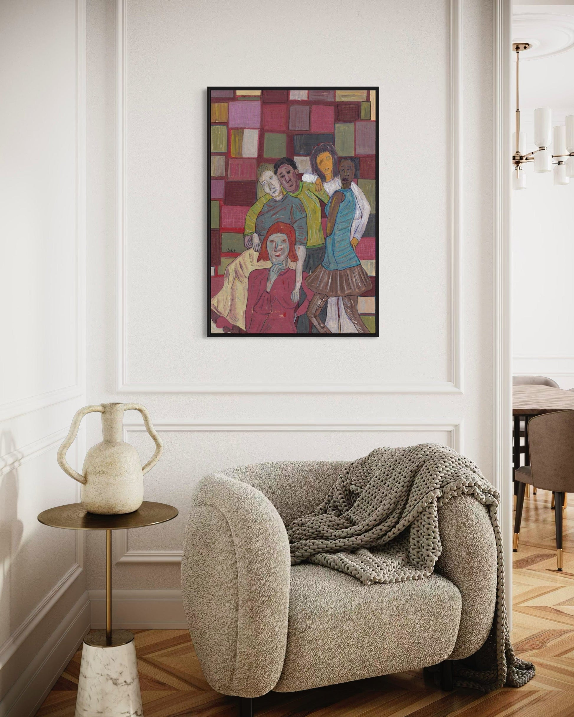 Living room with a textured armchair, side table, and colorful abstract painting on the wall.