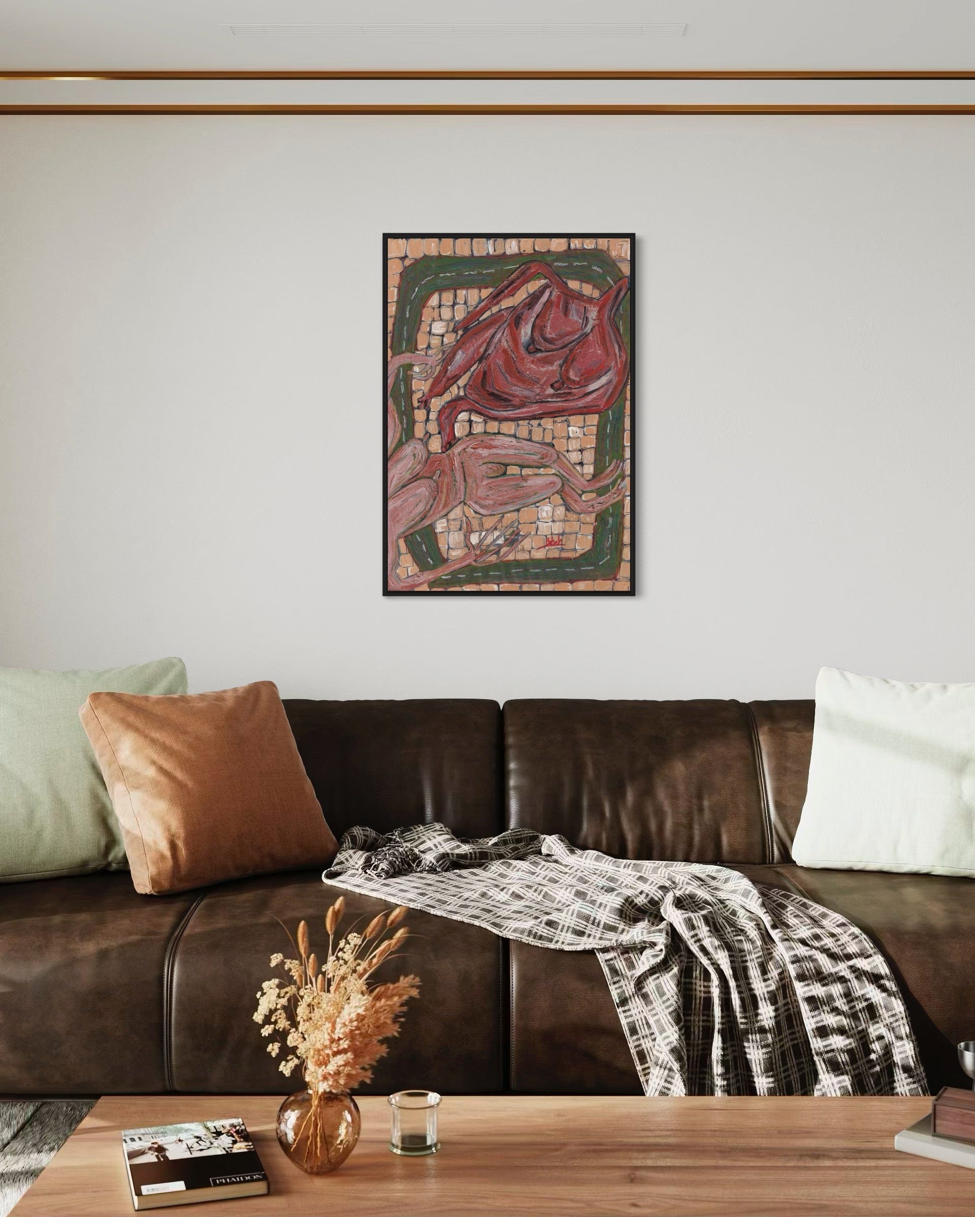 Living room with a brown leather sofa, decorative pillows, a wooden coffee table, and a wall art piece.