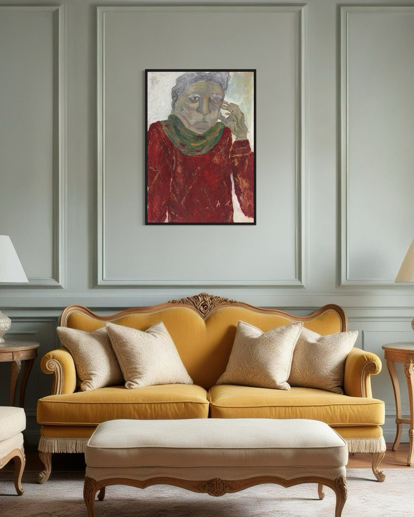 Yellow sofa with decorative pillows in a room with a framed painting on the wall.