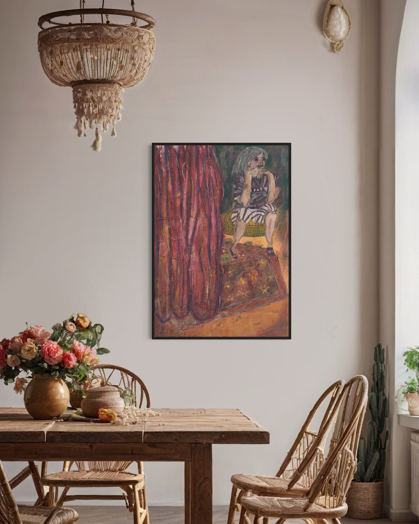 Dining room with wooden table, wicker chairs, and a colorful painting on the wall.