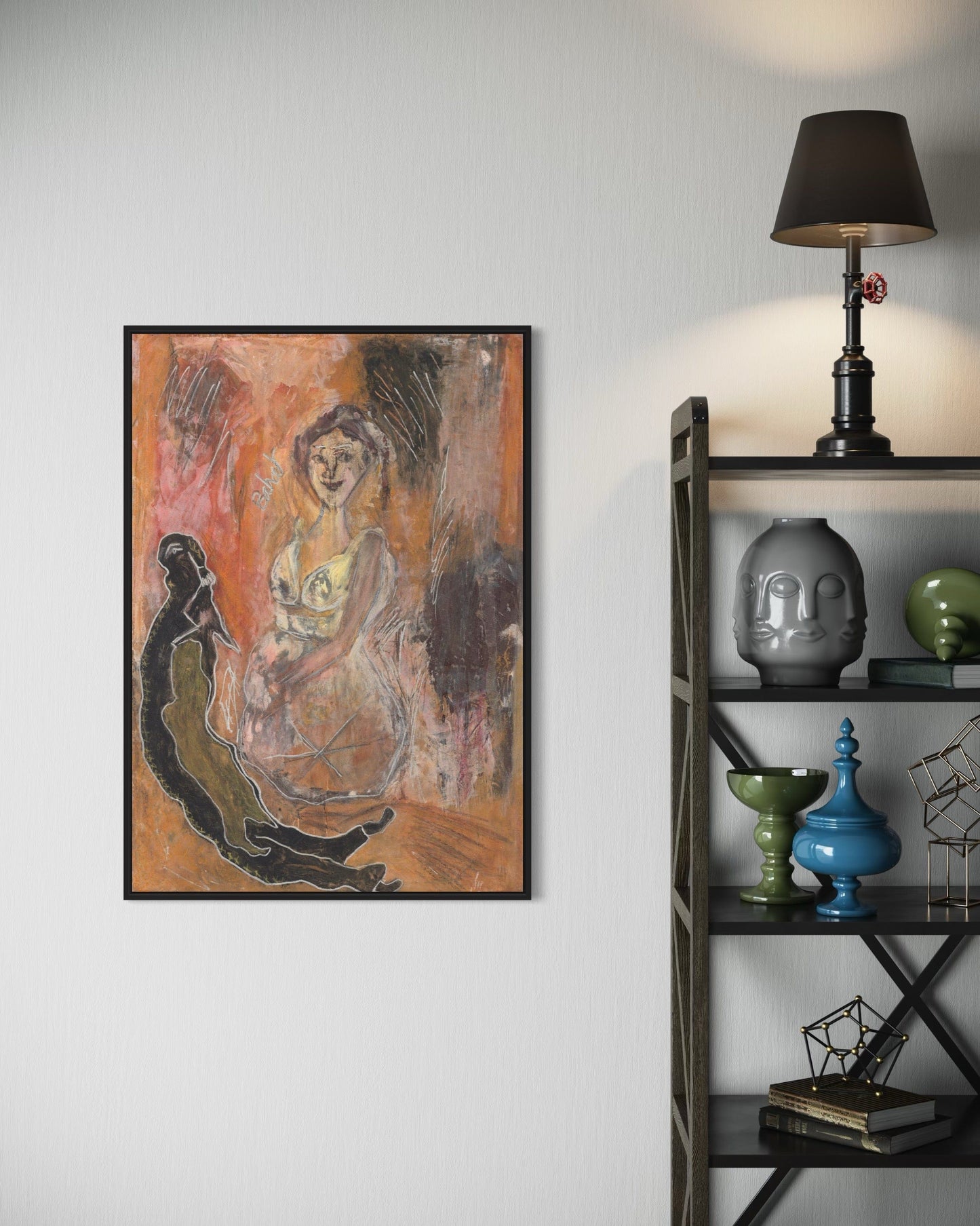 Framed abstract artwork on a wall next to a shelf with decorative items.