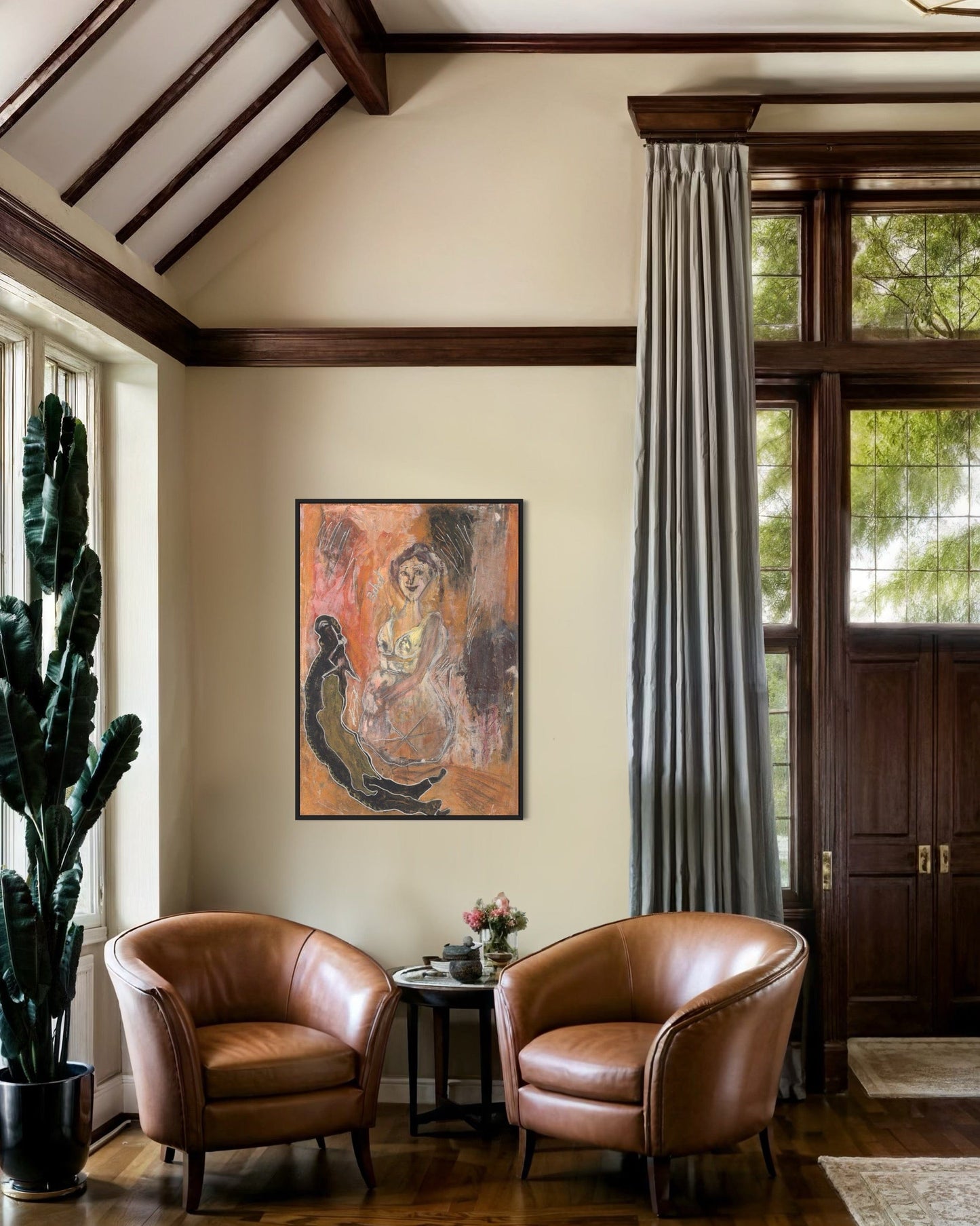 Living room with two brown leather chairs, a table with a vase, and a painting on the wall.
