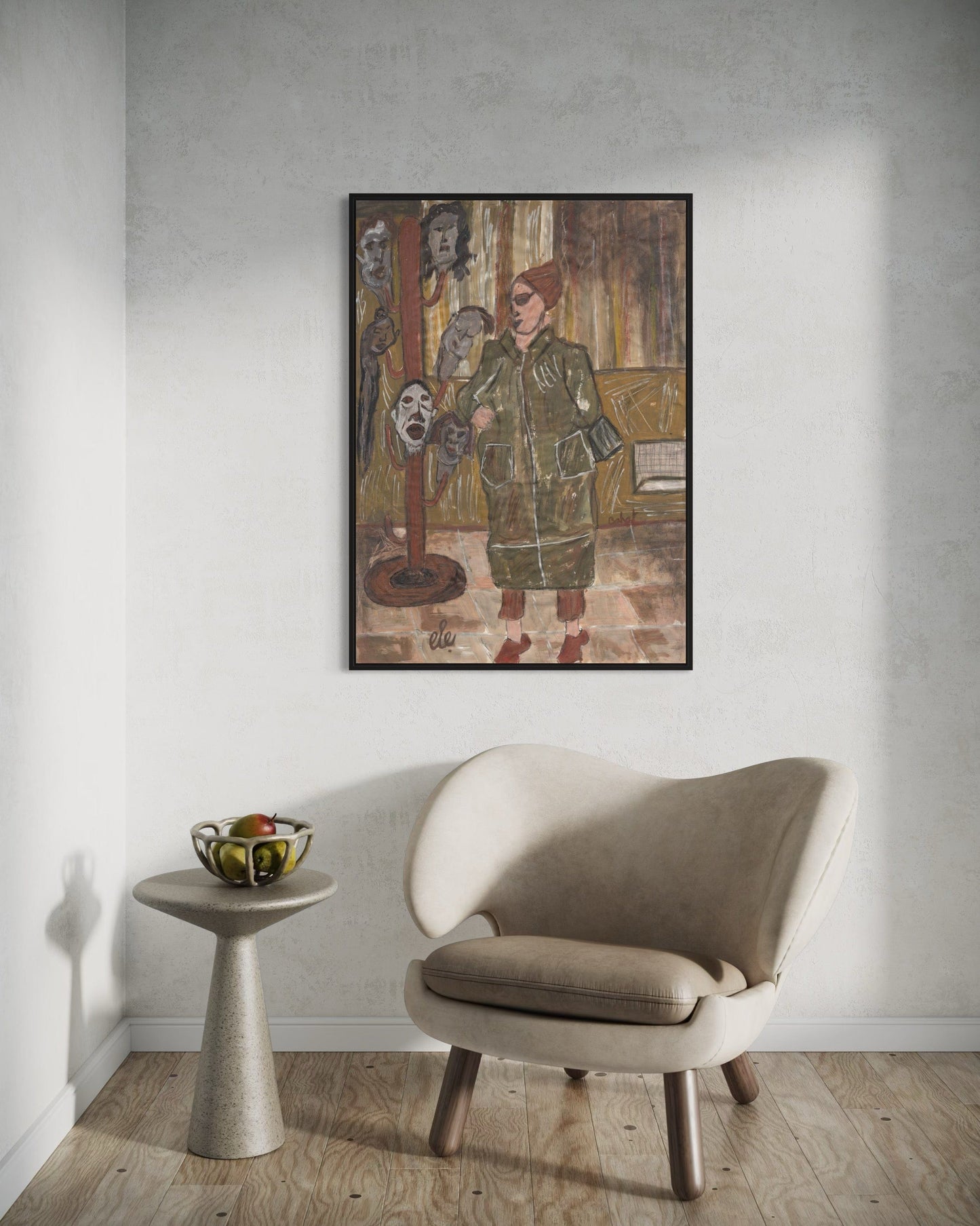Framed artwork on a wall above a modern chair and side table.