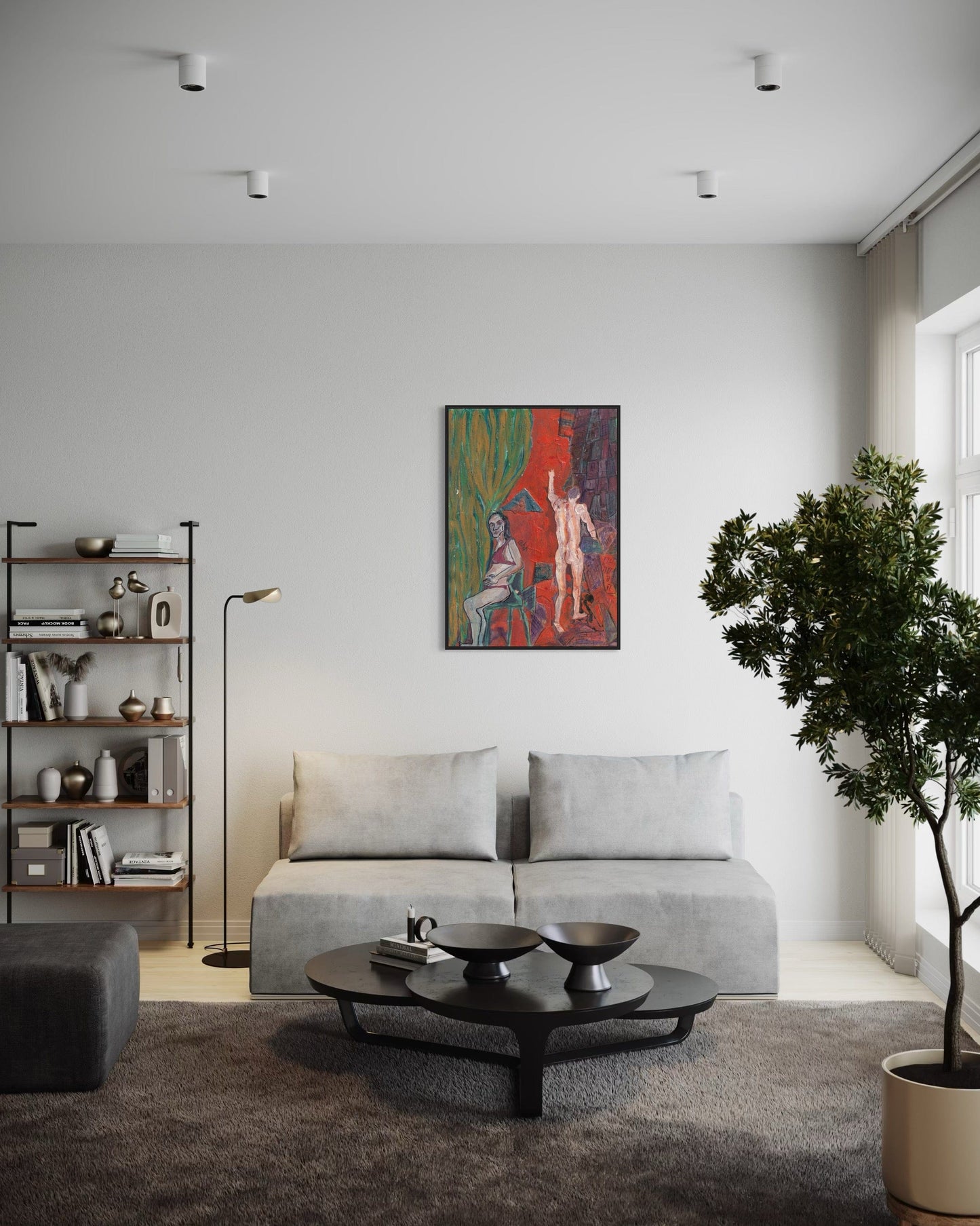 Modern living room with a gray sofa, coffee table, and wall art.
