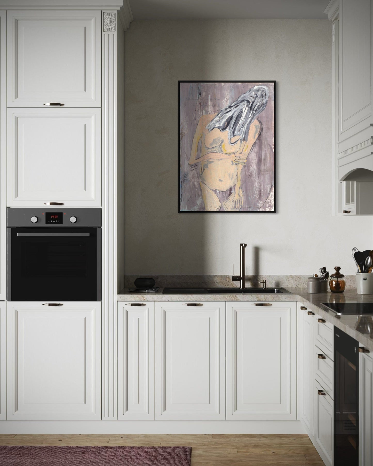 Modern kitchen with white cabinets, black appliances, and a painting on the wall.