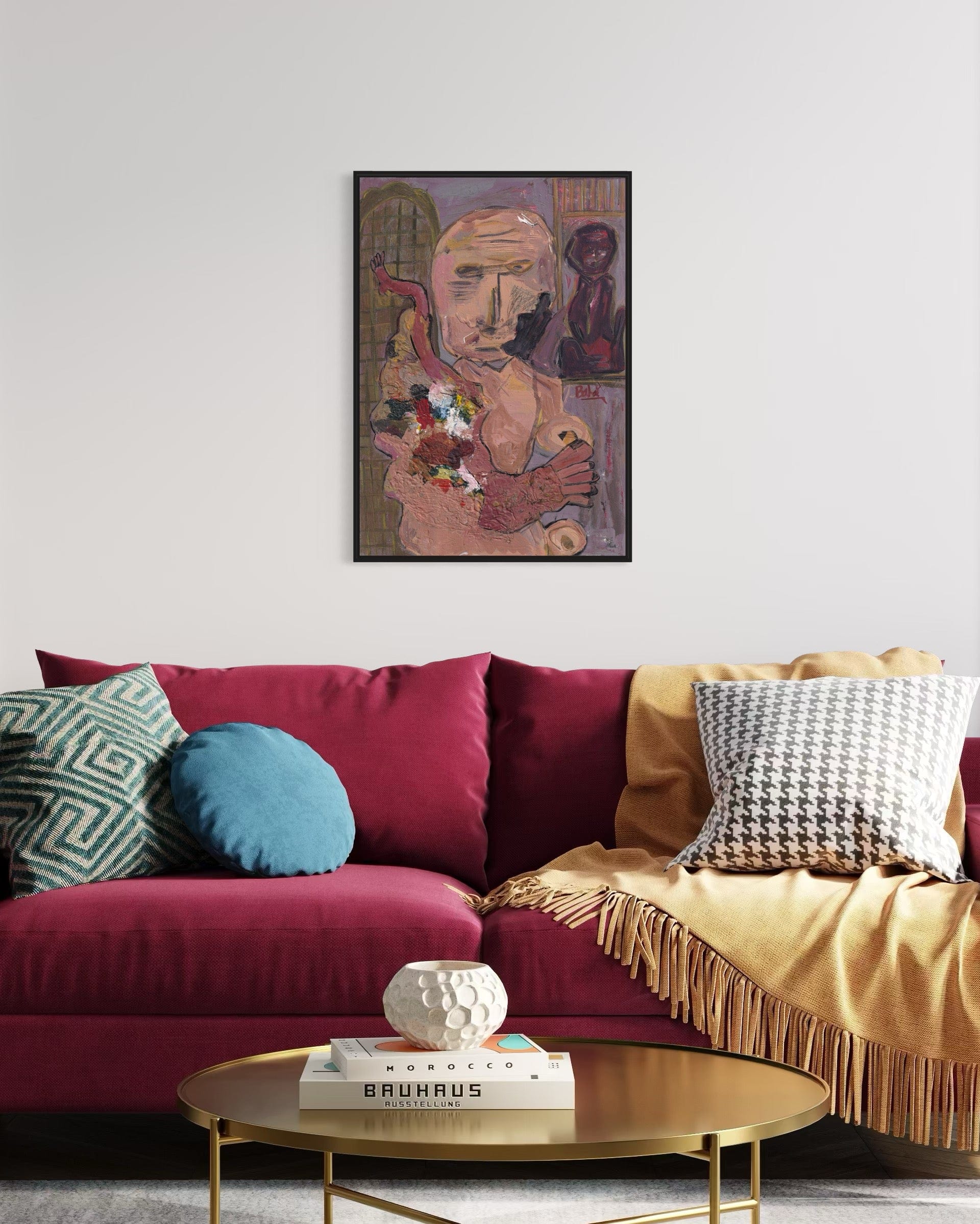 Living room with a colorful sofa, coffee table, and framed artwork on the wall.