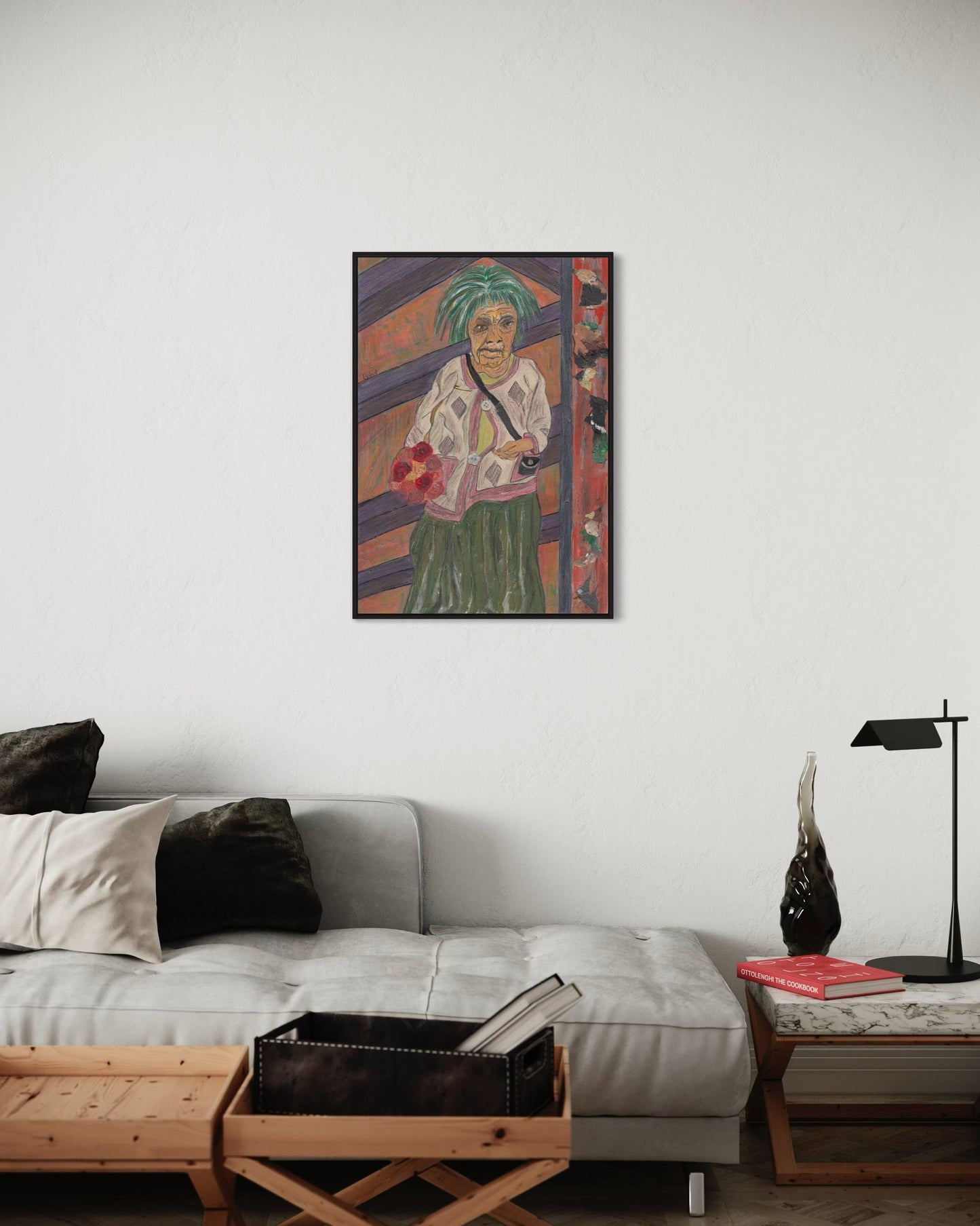 Living room with a painting of a woman on the wall above a sofa.