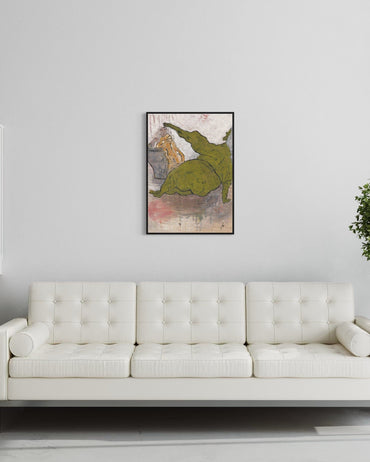 White sofa in a room with a framed artwork of a green dragon on the wall.