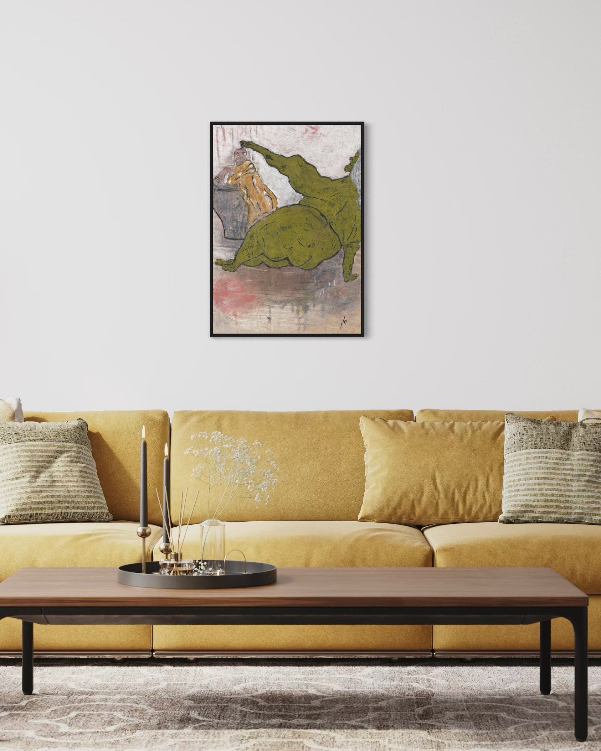 Yellow sofa with a coffee table and a framed artwork on the wall in a living room setting.