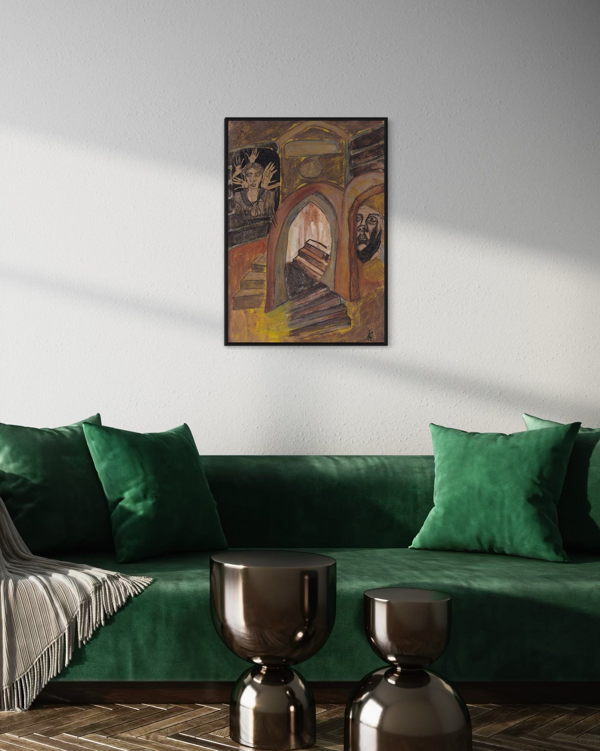 Green velvet sofa with decorative pillows in a living room setting, featuring a framed painting on the wall.