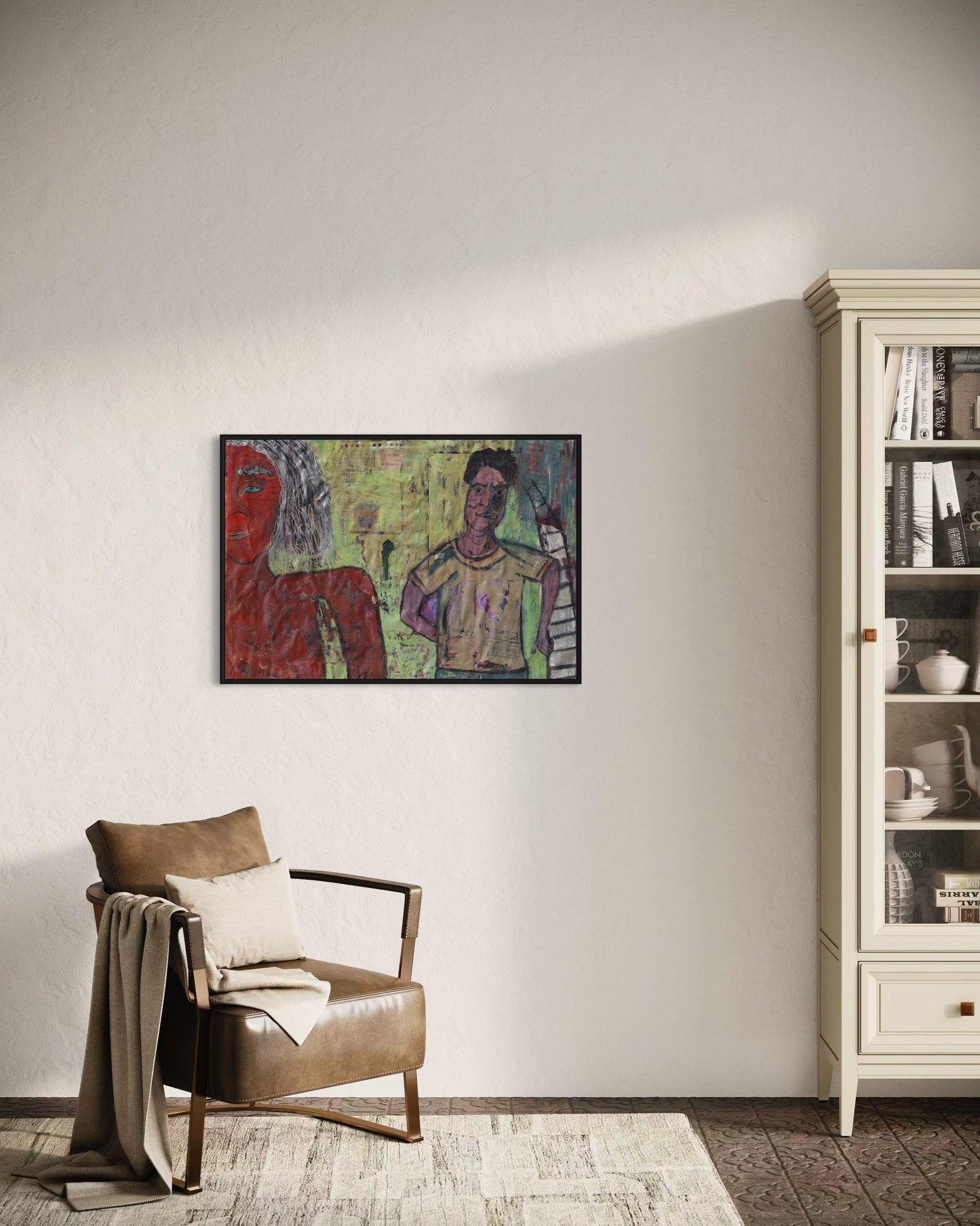 Living room with a brown armchair, abstract painting on the wall, and a white bookshelf.