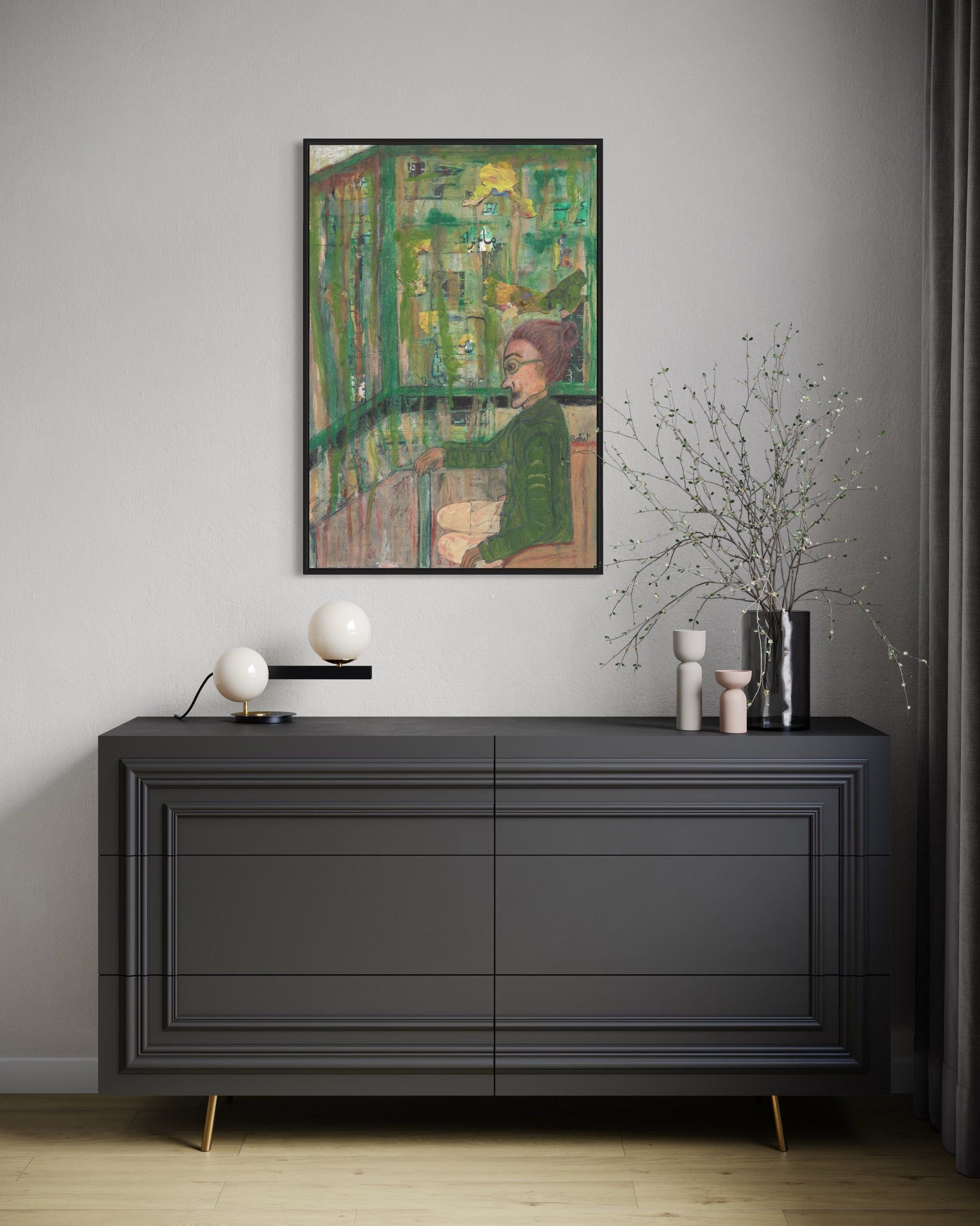 Modern interior with a dark gray dresser, decorative items, and a framed painting on a gray wall.