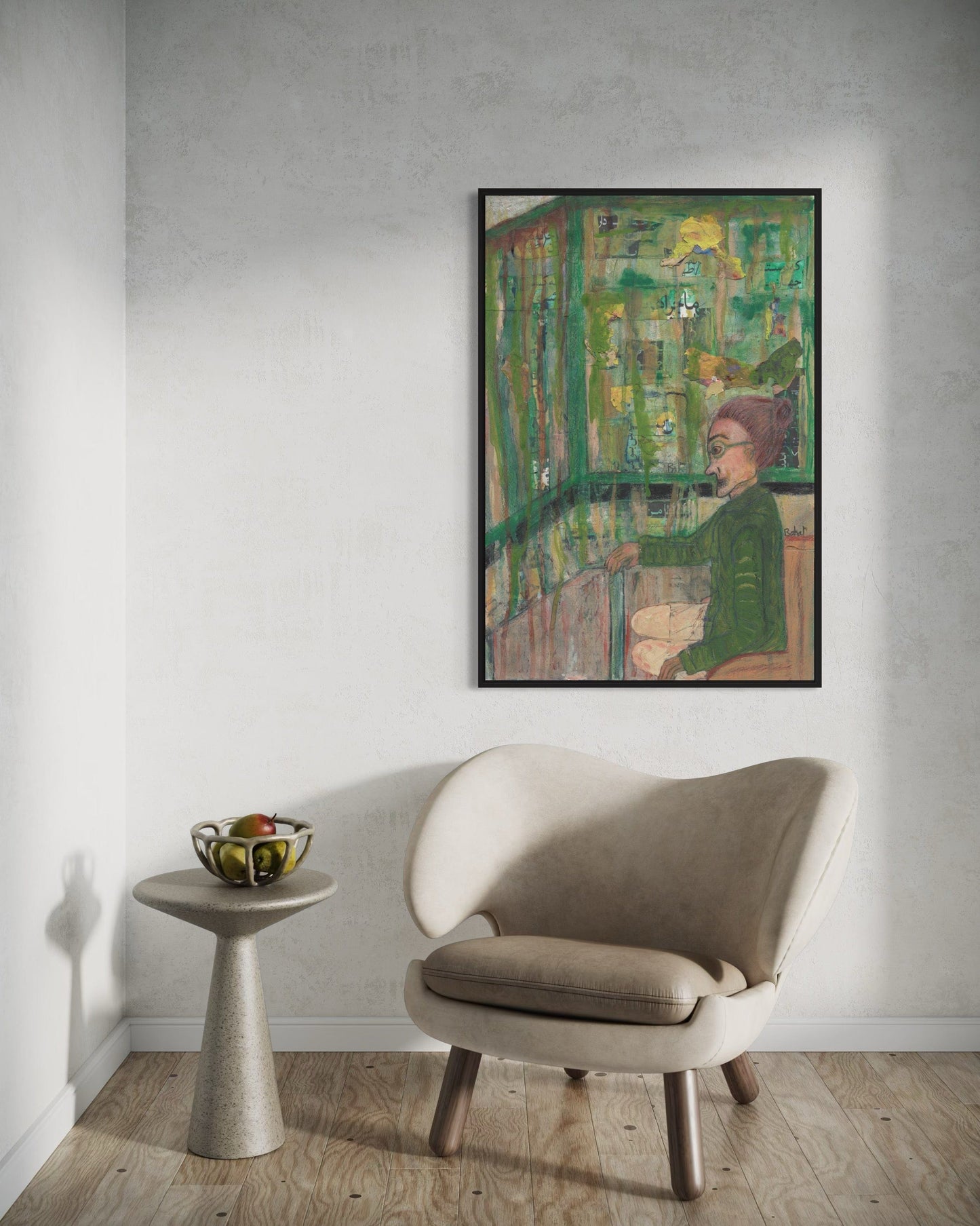 Framed abstract painting on a wall above a beige armchair and small table.