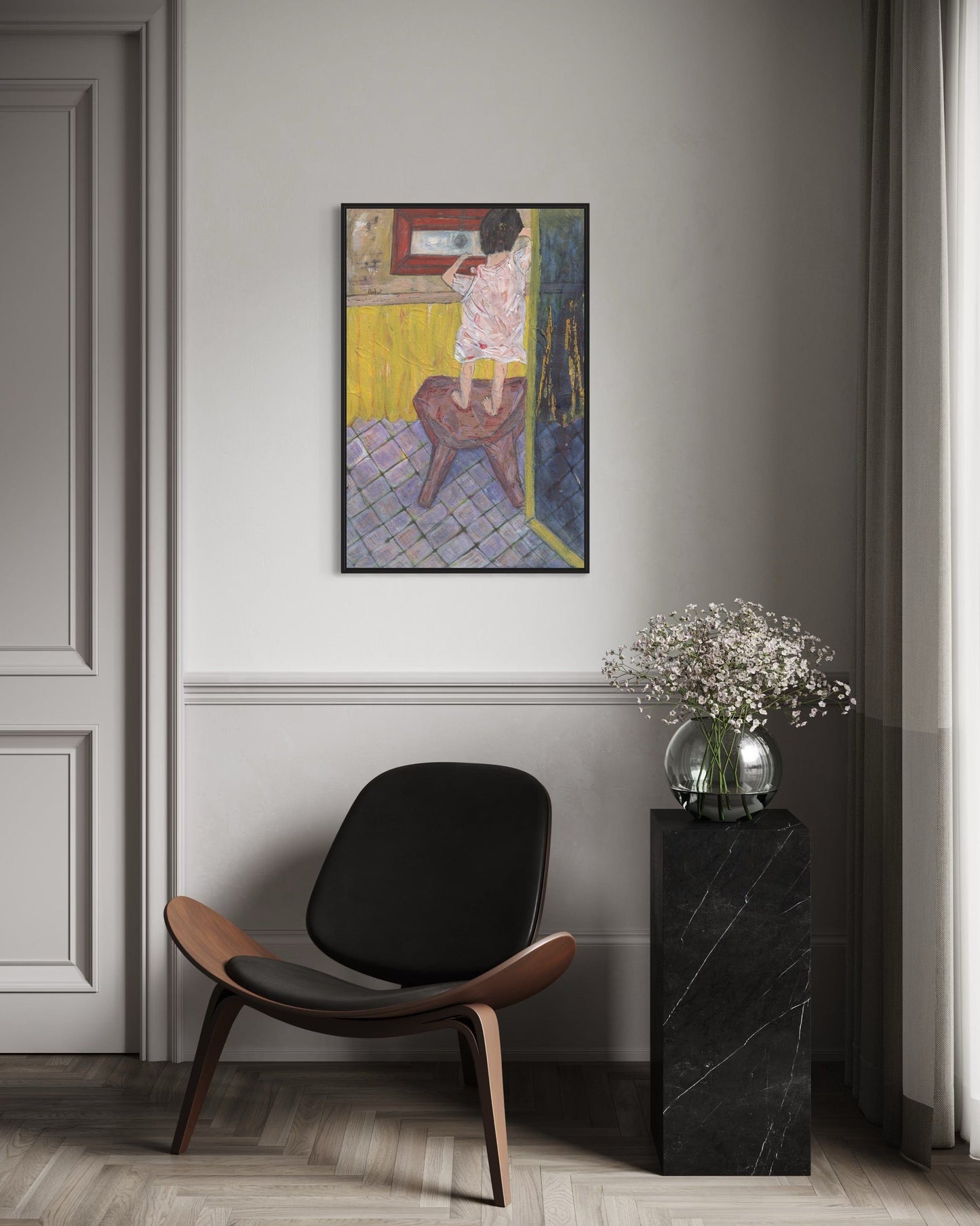 Modern interior with a black chair, side table, and abstract painting on the wall.